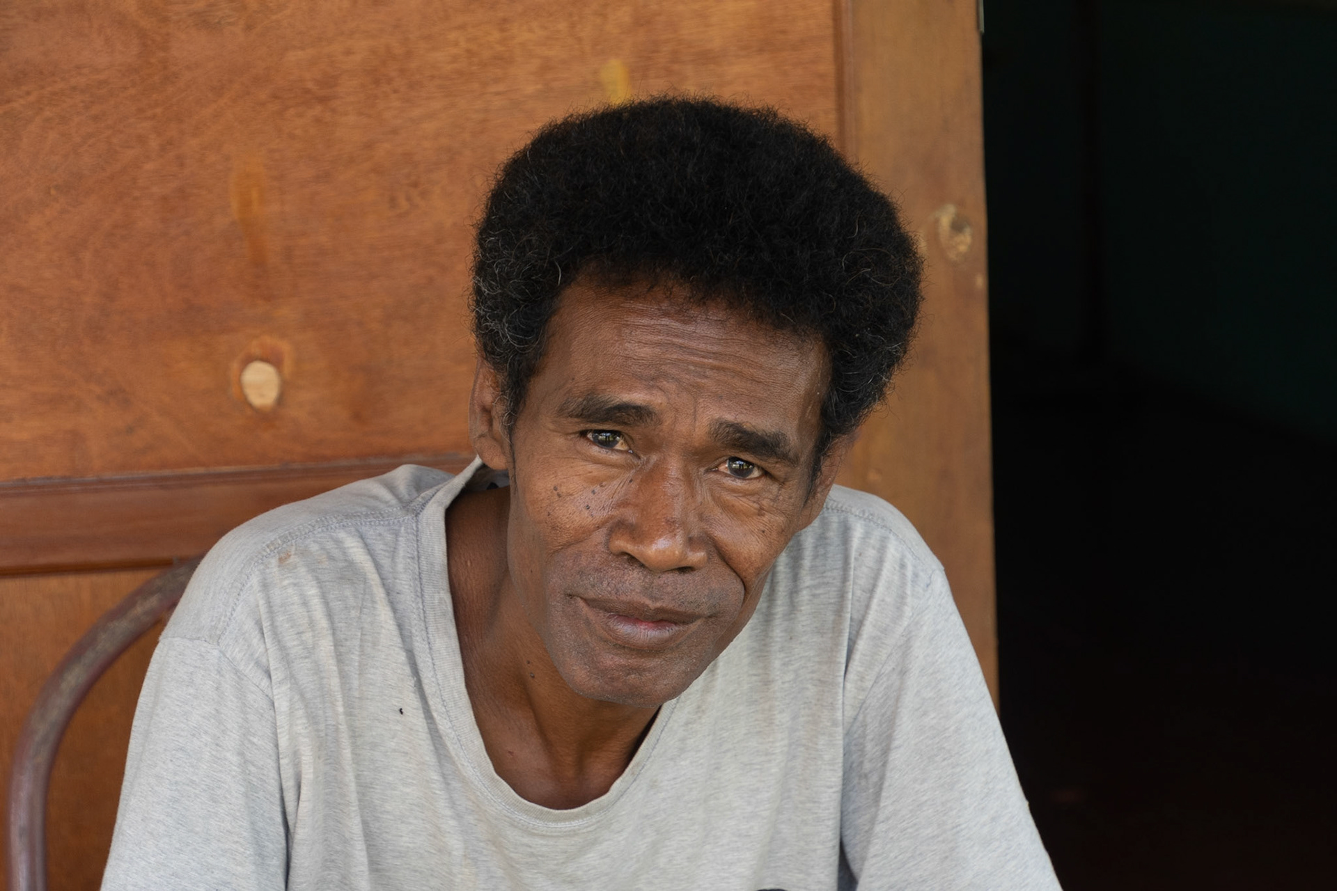 Homestay owner, Moni, Indonesia