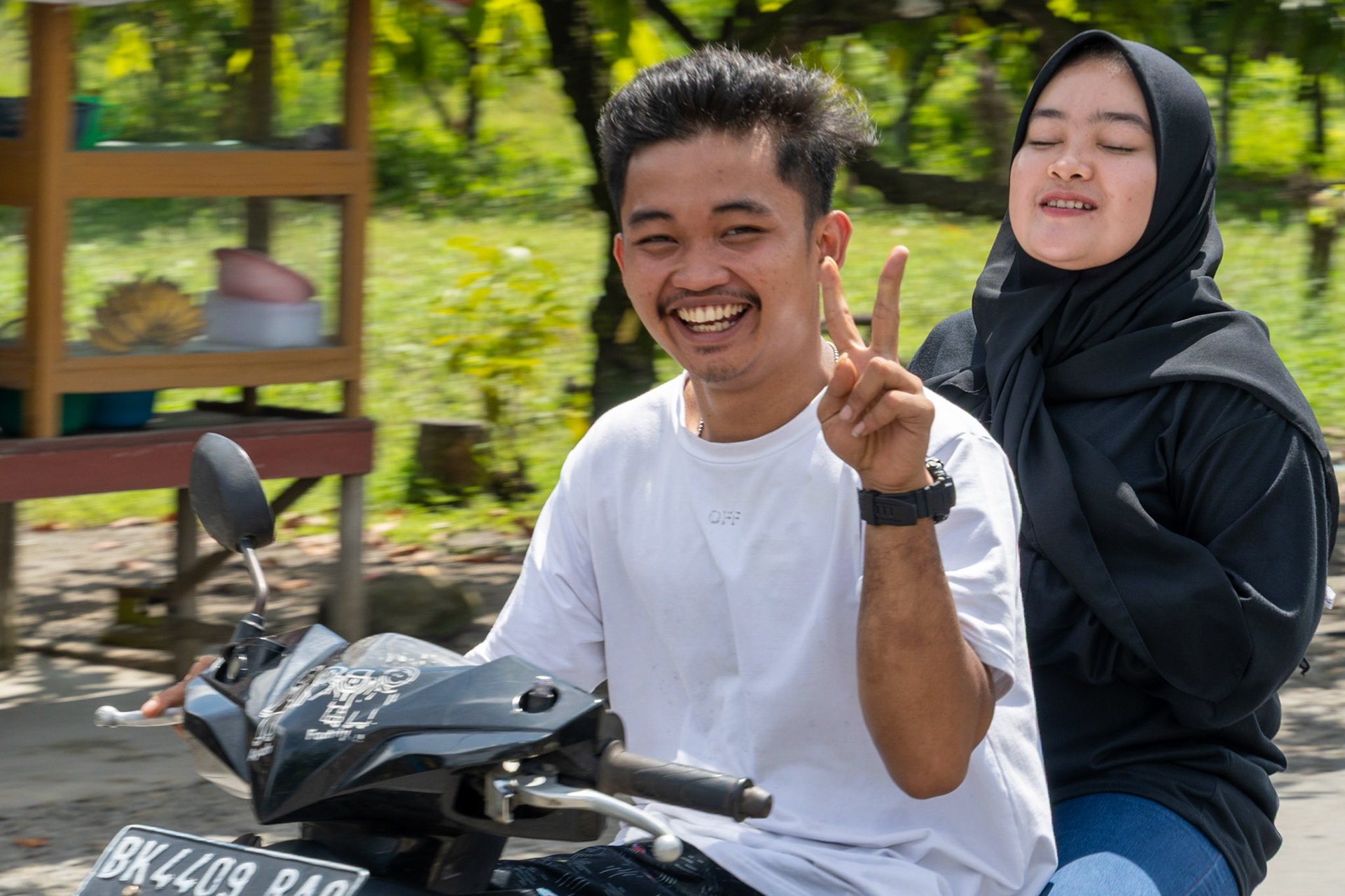 Happy couple, en route to Berastagi, Indonesia