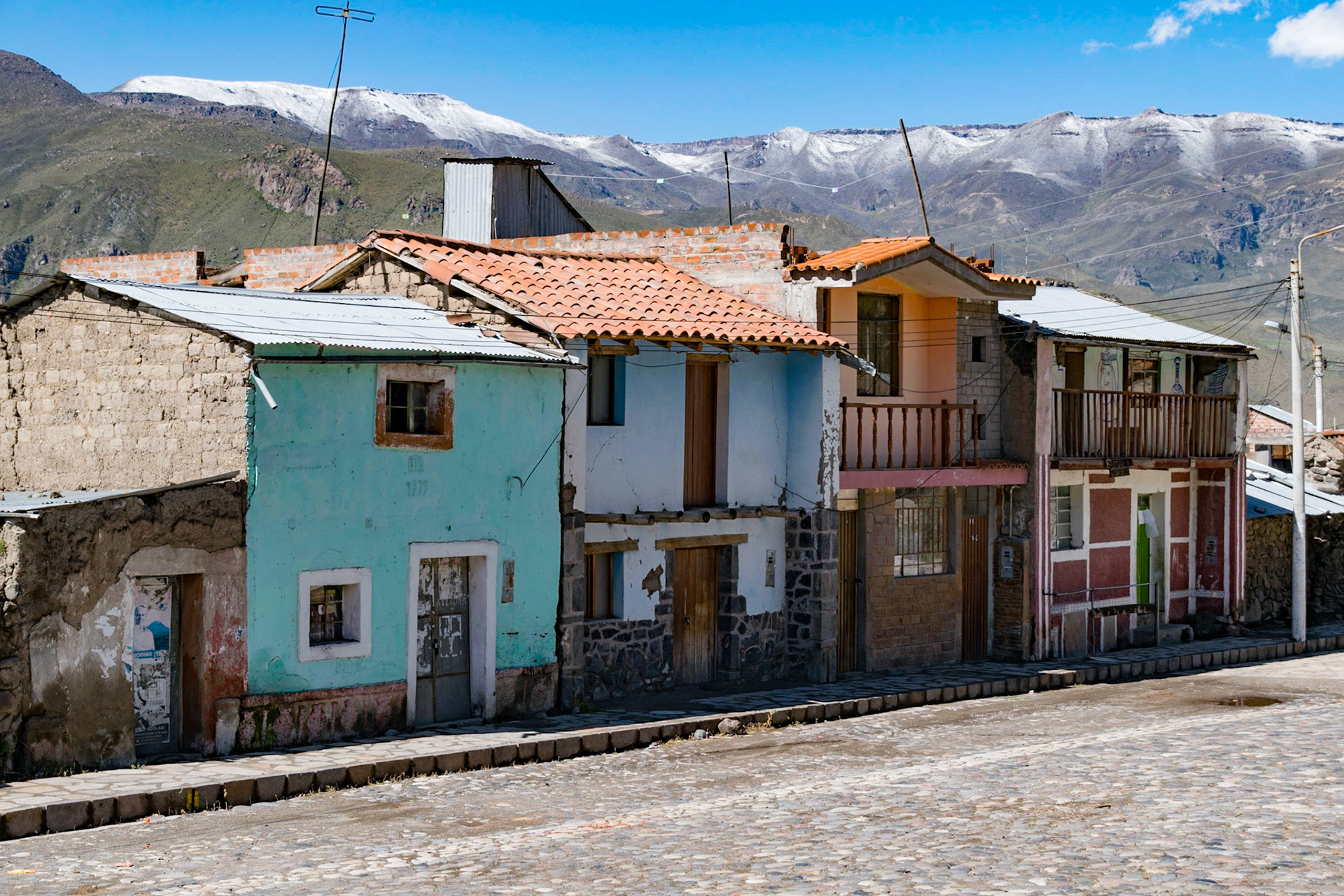 Houses in village square, Corporaque