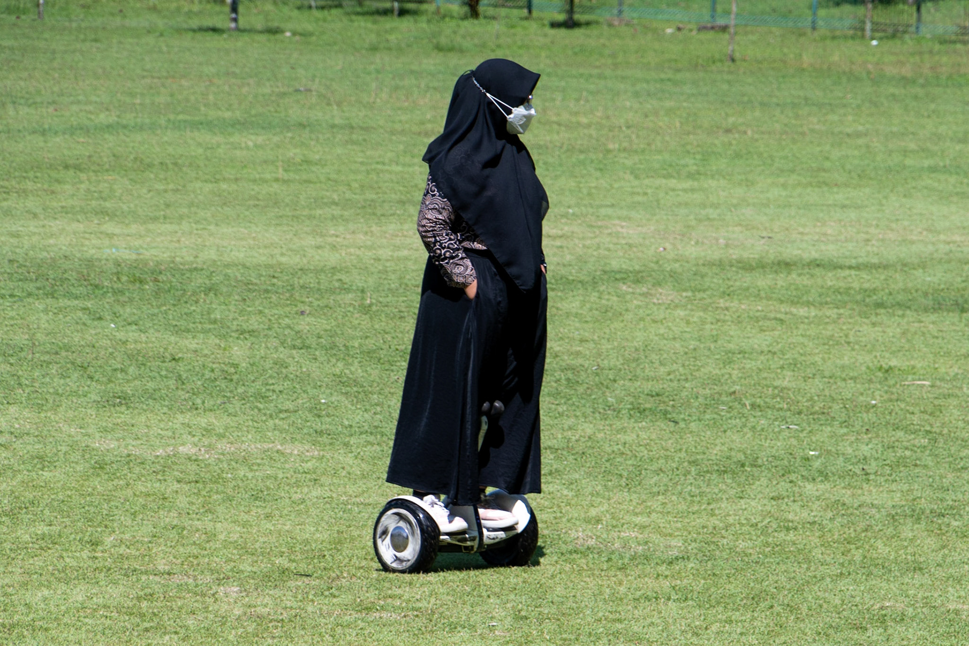 Lady on hoverboard, Prambanan, Java, Indonesia, 2022