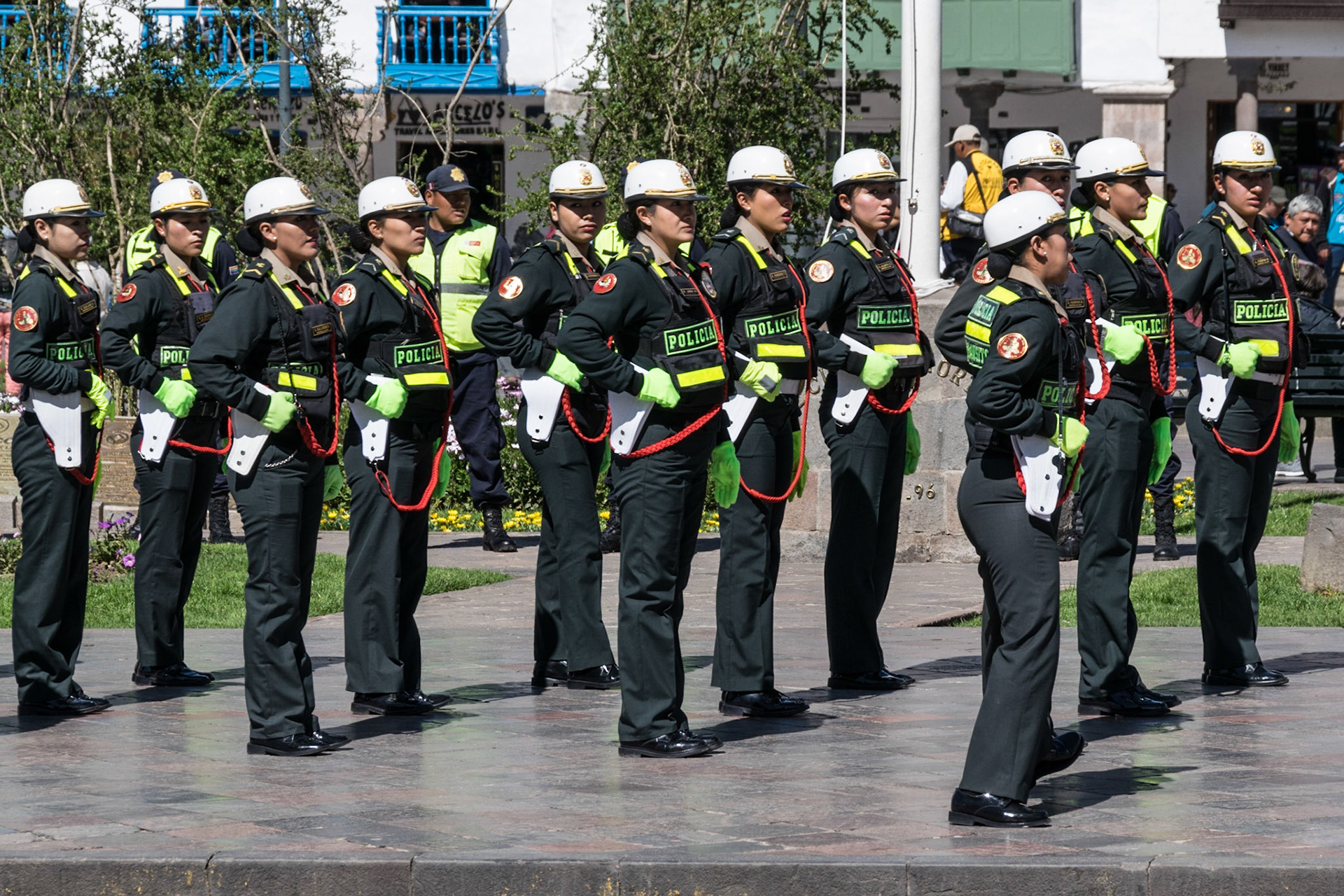 Lady traffic cops, Military parade, Cusco, Peru