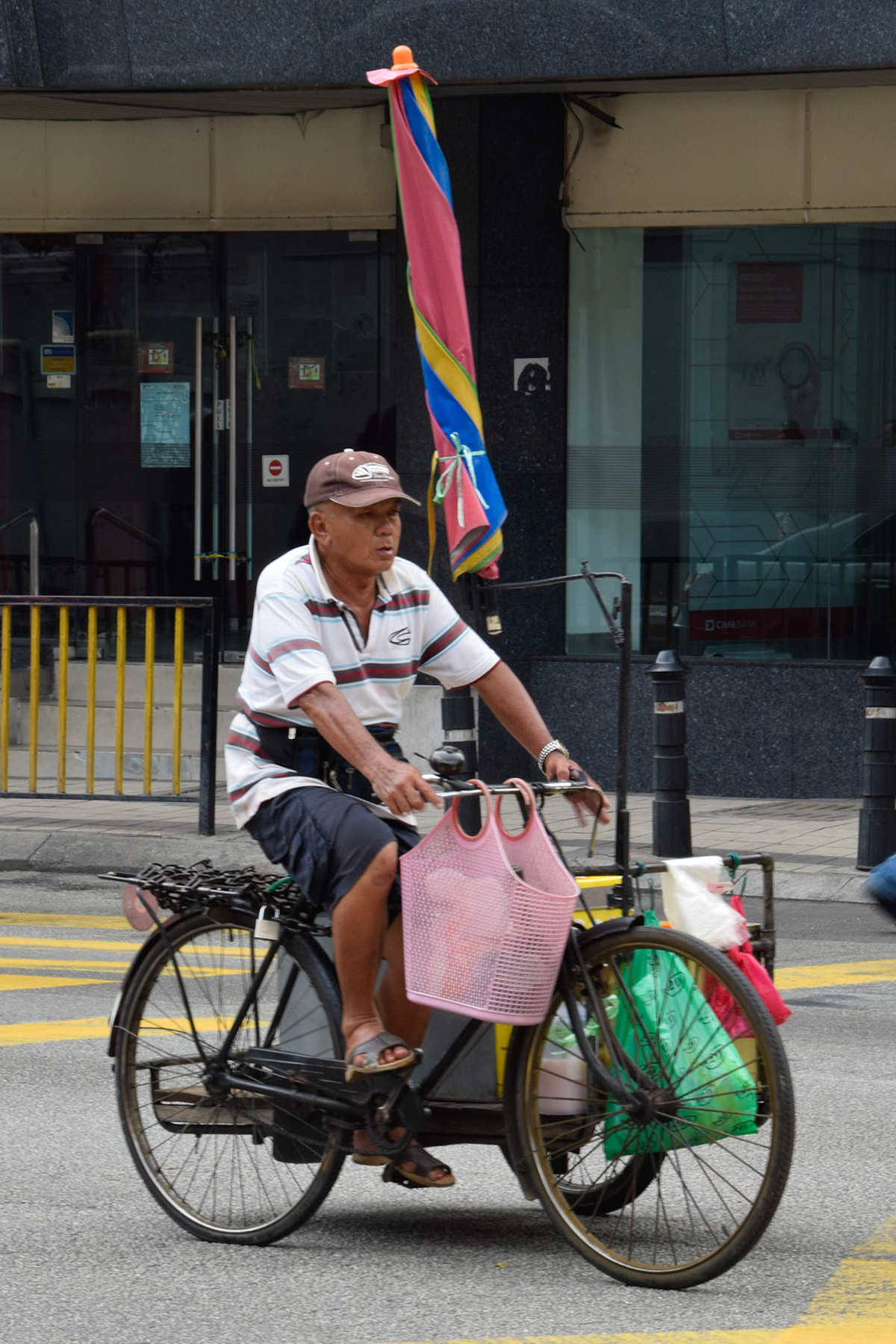 Man on cycle rickshaw, Kuala Lumpur, Malaysia