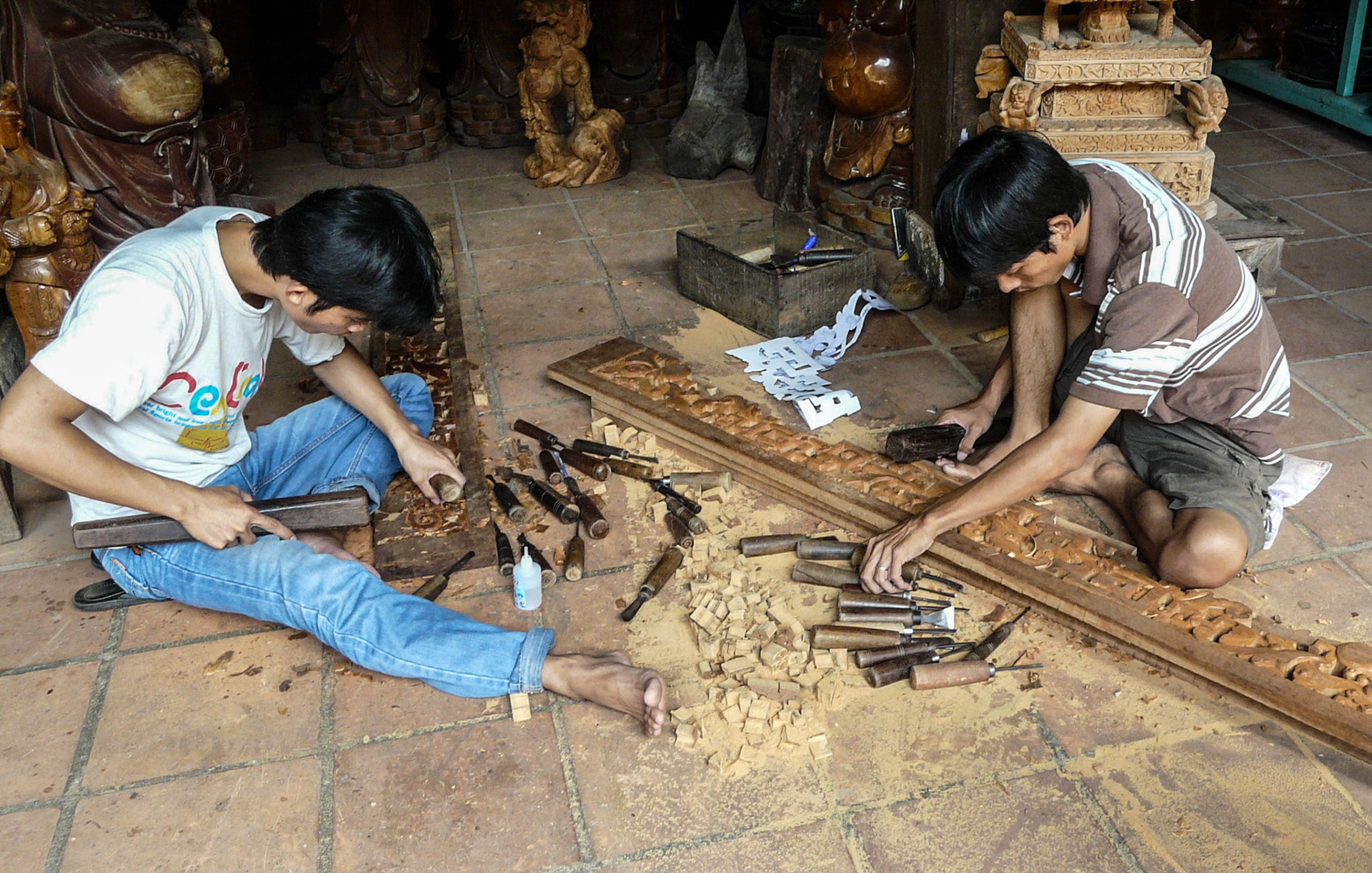 Wood carvers, Hoi An, Vietnam