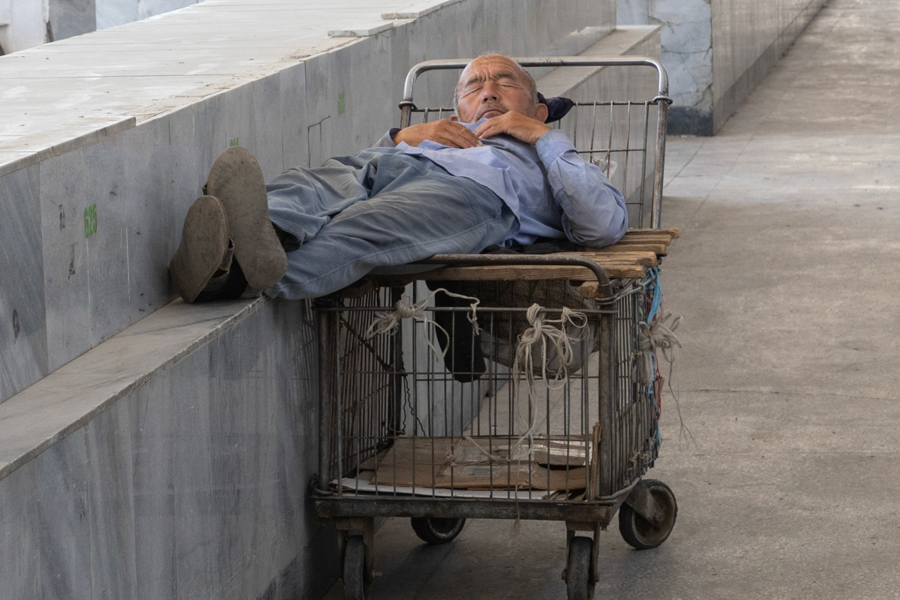 Sleeping man, Samarkand, Uzbekistan, 2019