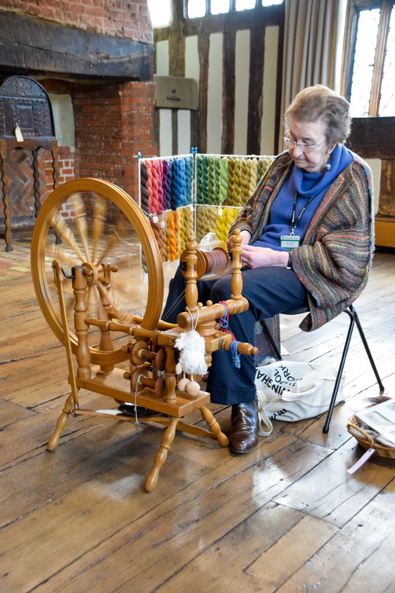 Lady spinning wool, Lavenham, United Kingdom, 2016