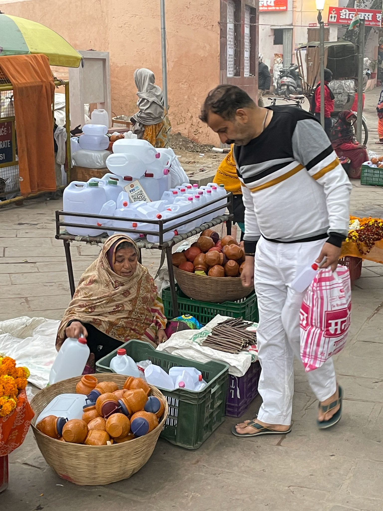 Water container seller, Varanasi