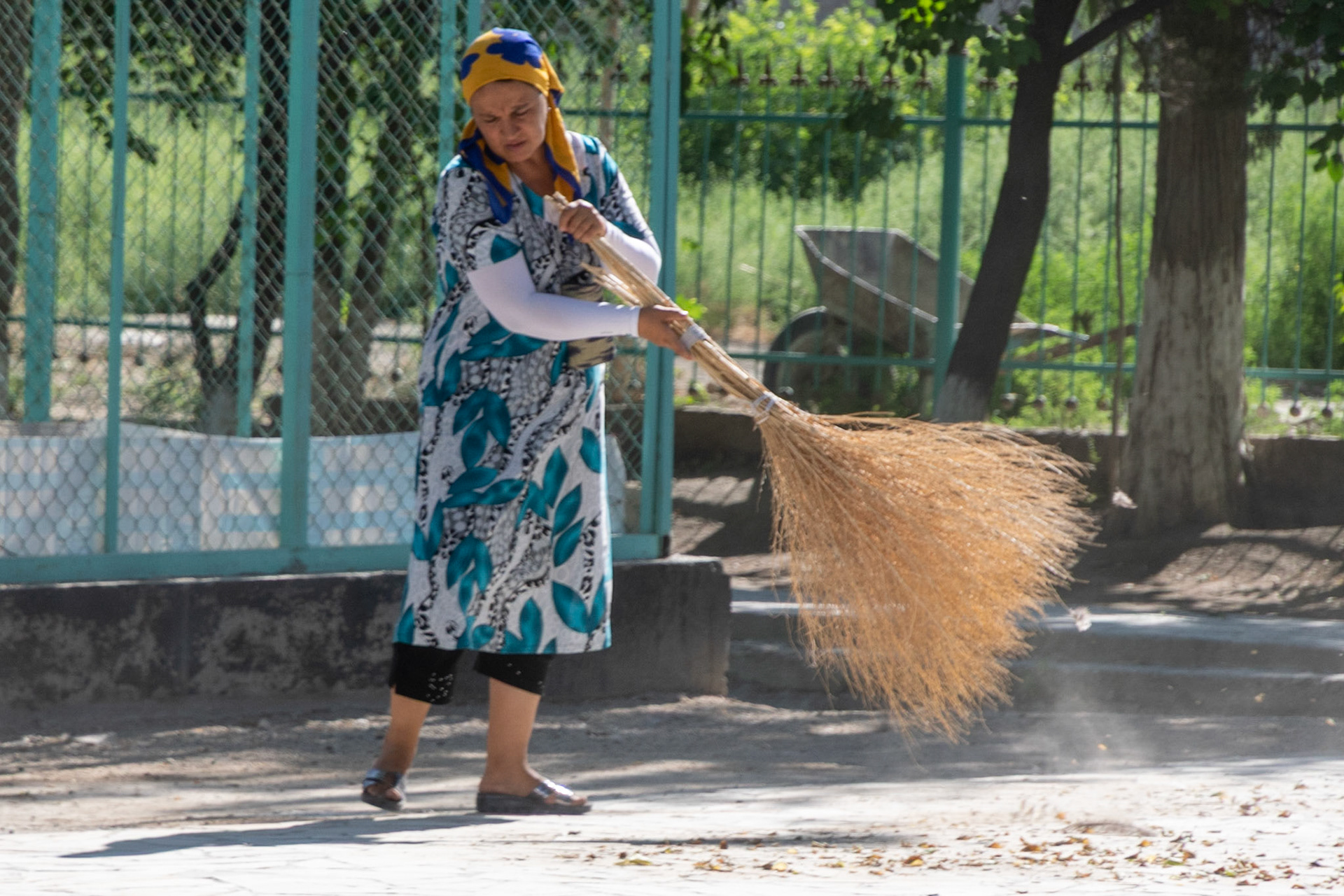 Lady sweeping, Bukhara, Uzbekistan