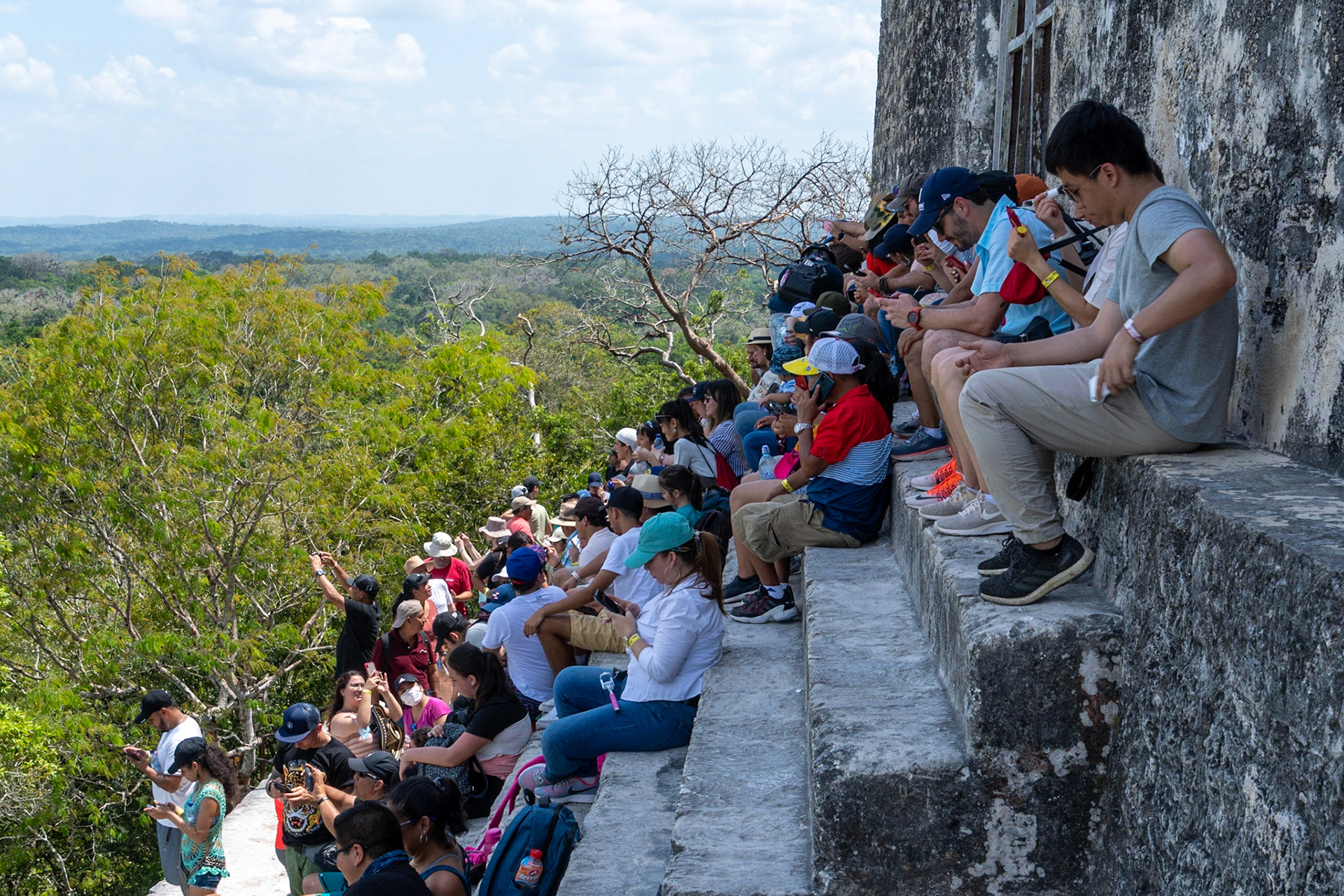 Tourists atop Temple IV, Tikal