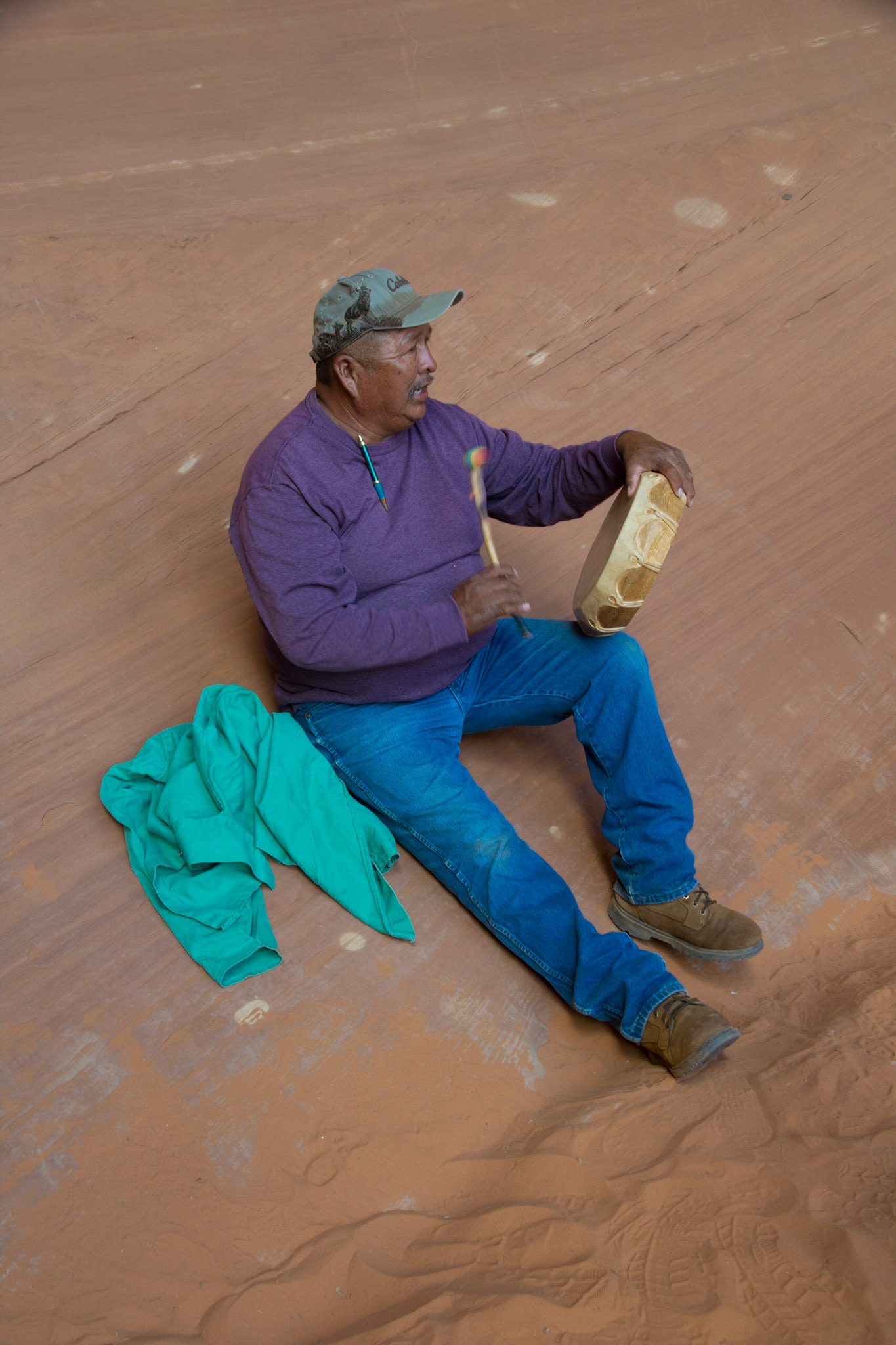 Navajo guide playing drum, Monument Valley, United States of America