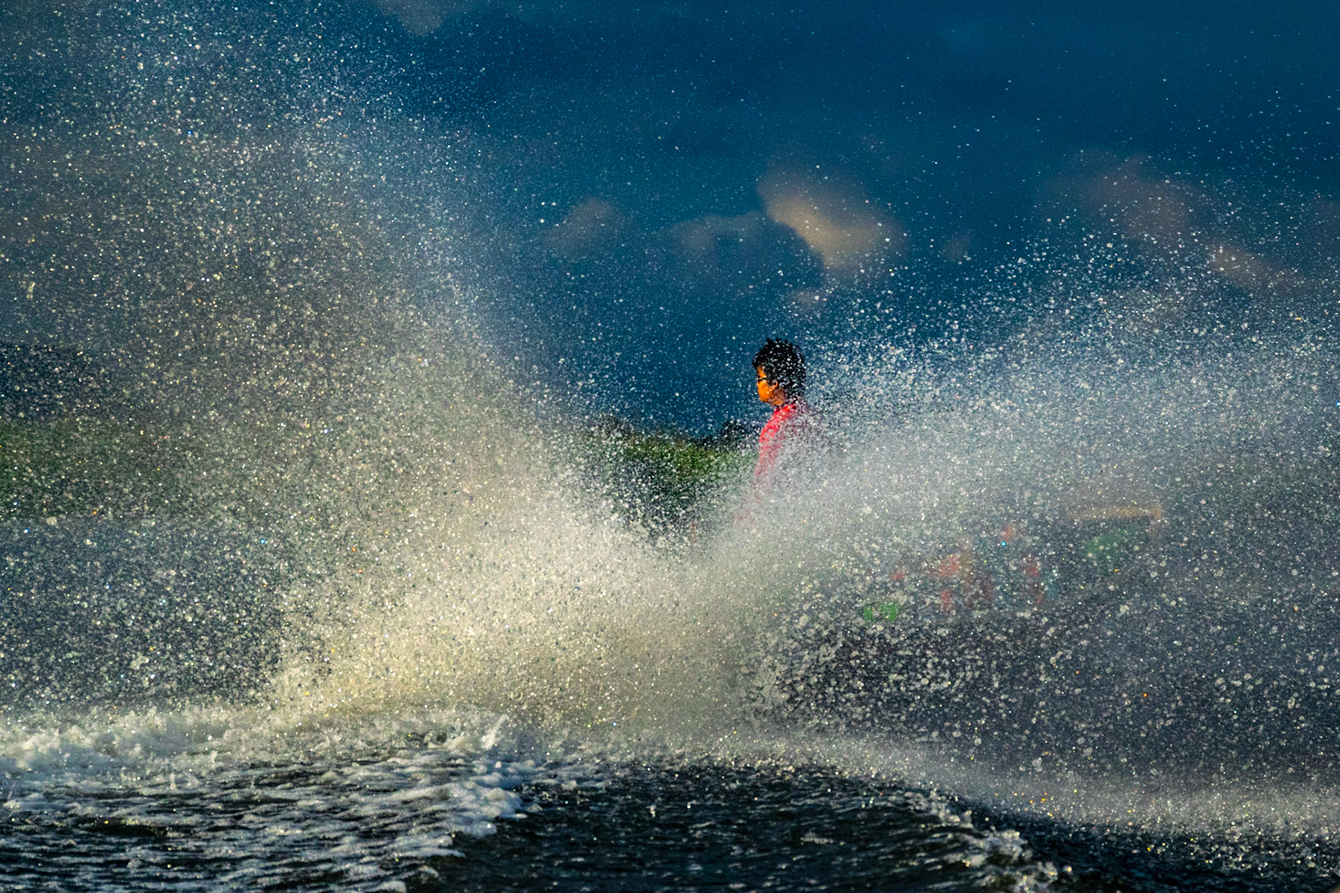 Boatman through spray, Inle lake