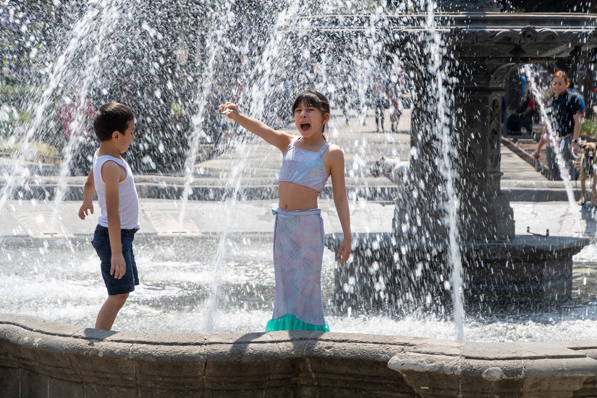 Children playing in fountain, Alameda Park, Mexico City, Mexico, 2022