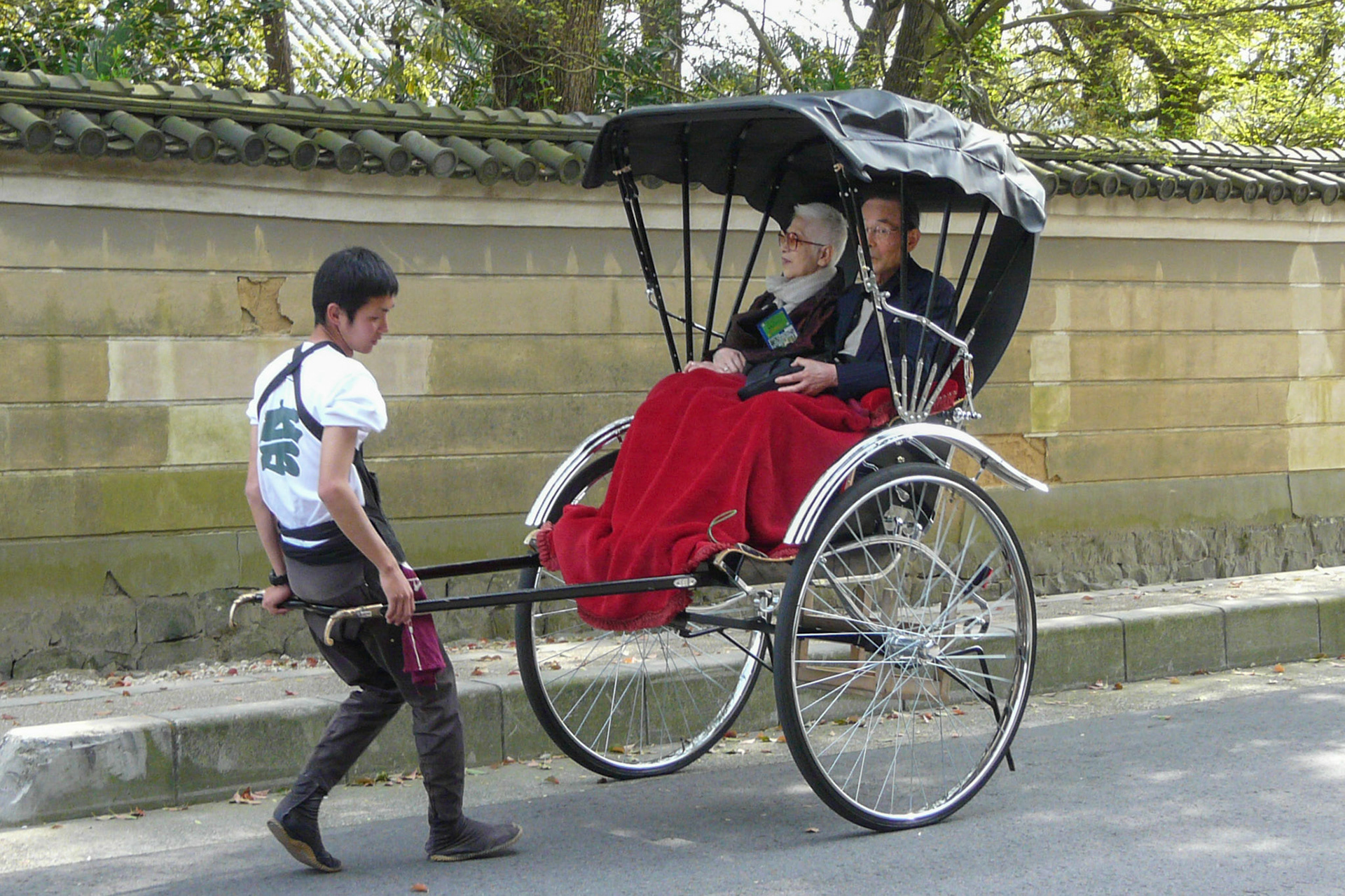Man and woman in rikshaw, Nara, Japan