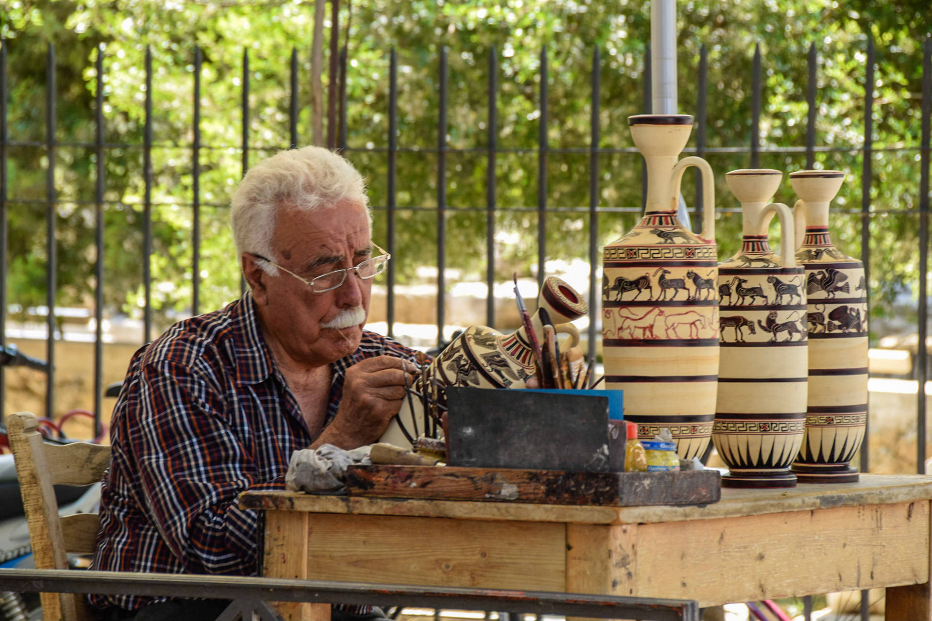 Pottery artist, Corinth, Greece, 2015