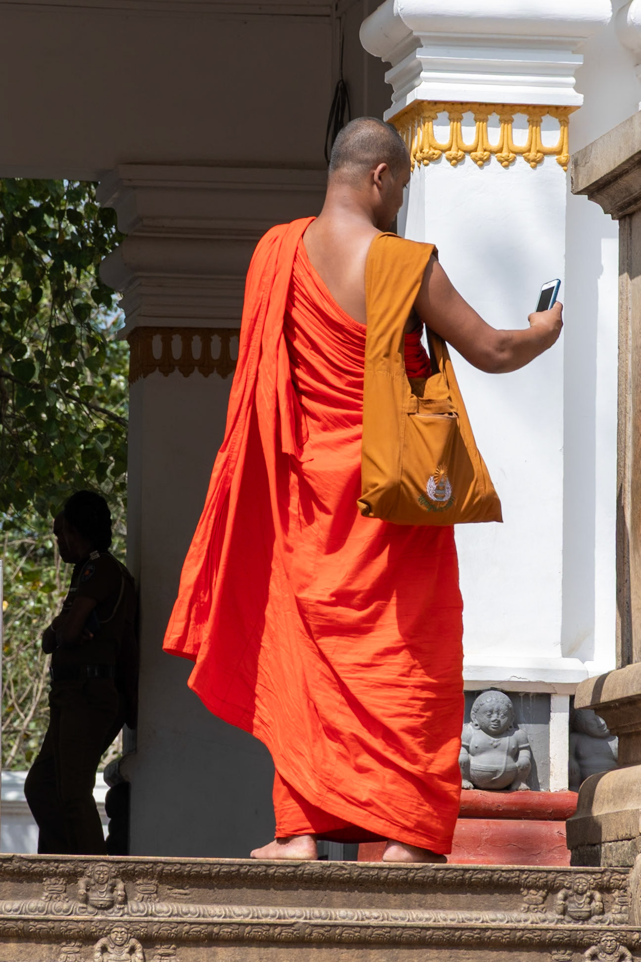 Monk taking selfie, Jaya Sri Maha Bodhi, Anuradhapura, Sri Lanka, 2024