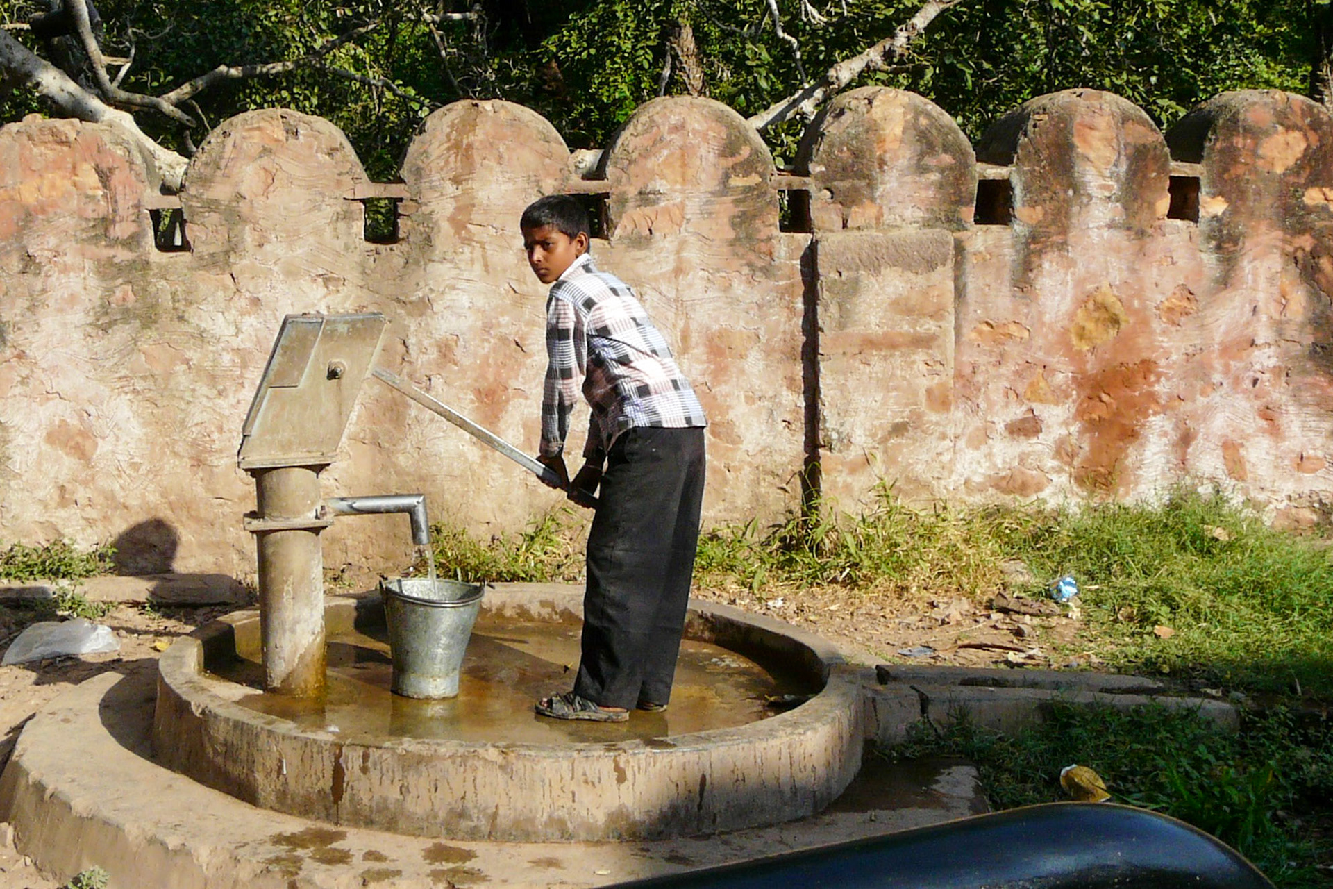 Boy at well, Ranthambore, India