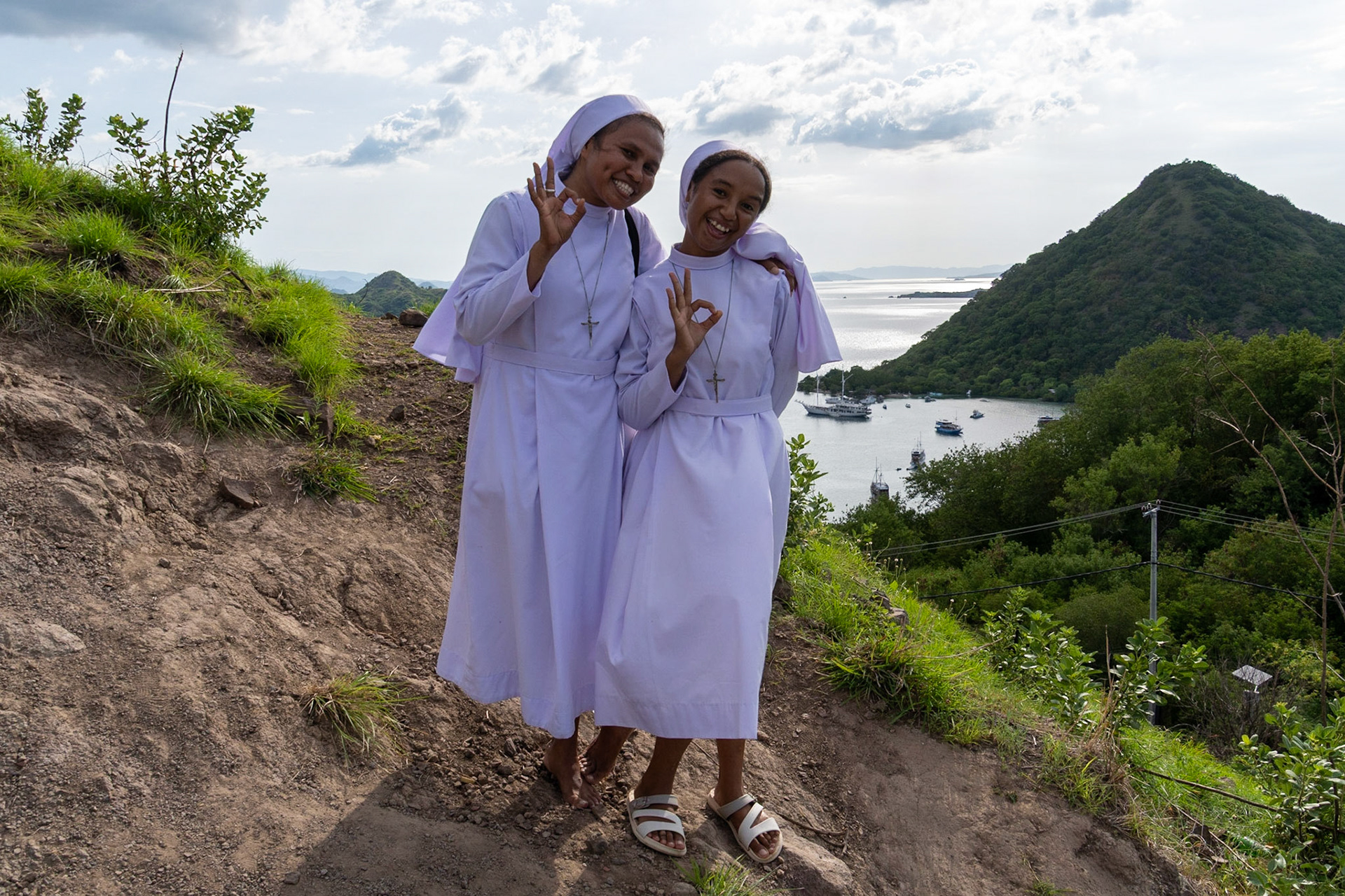Two nuns on Bukit Amelia, Labuan Bajo, Flores, Indonesia, 2022