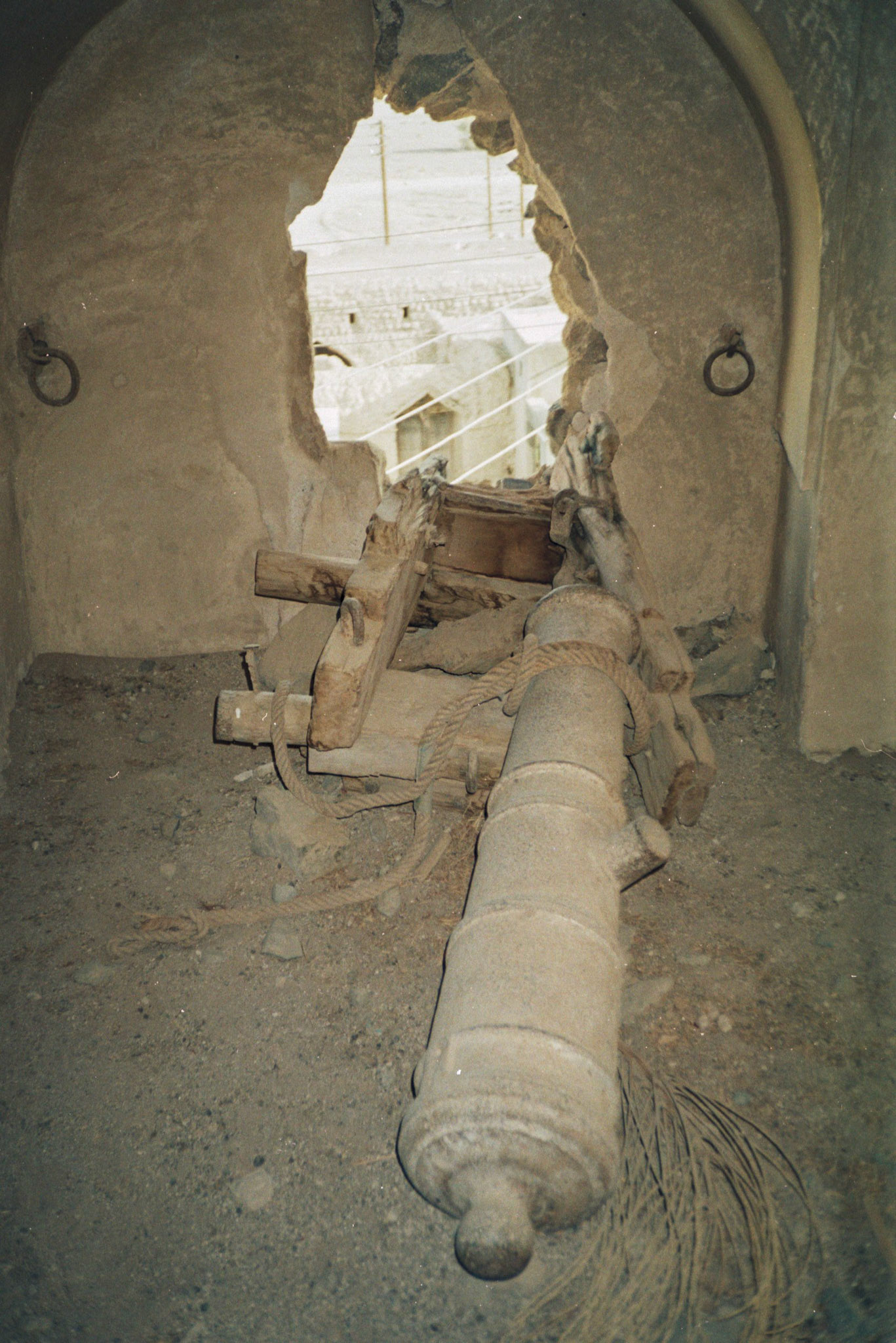 Cannon inside watchtower, Al Aqdar
