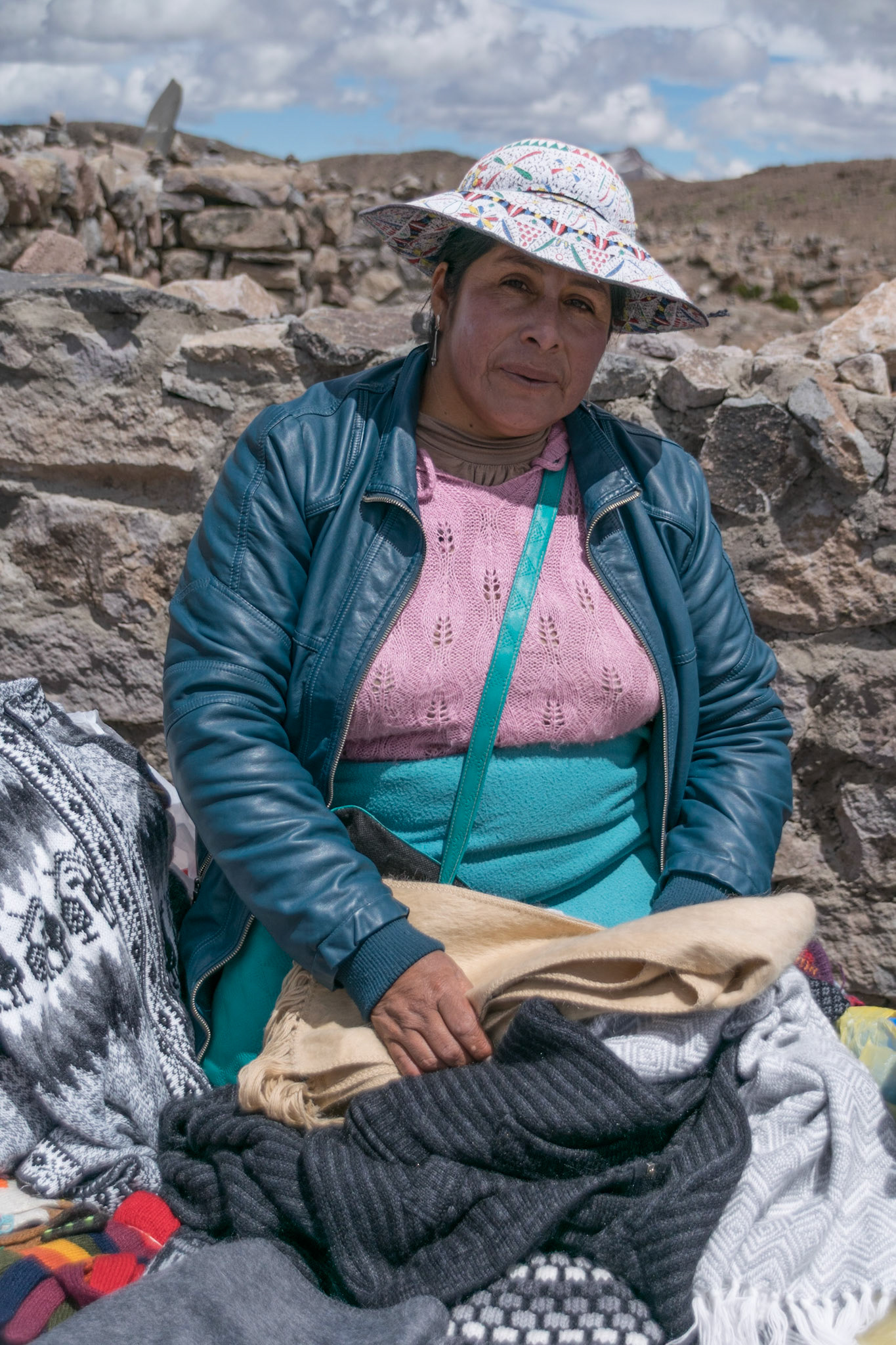 Lady selling handicrafts, Mirador de los Andes, en route to Chivay, Peru