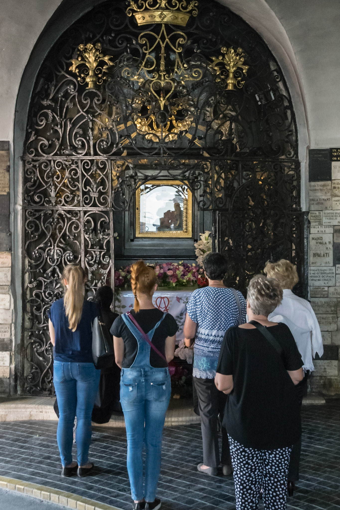 Worshippers at Icon of Virgin Mary, Stone Gate, Zagreb, Croatia