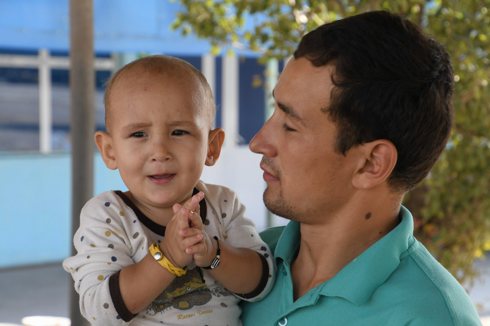 Father and son, Anau, Turkmenistan