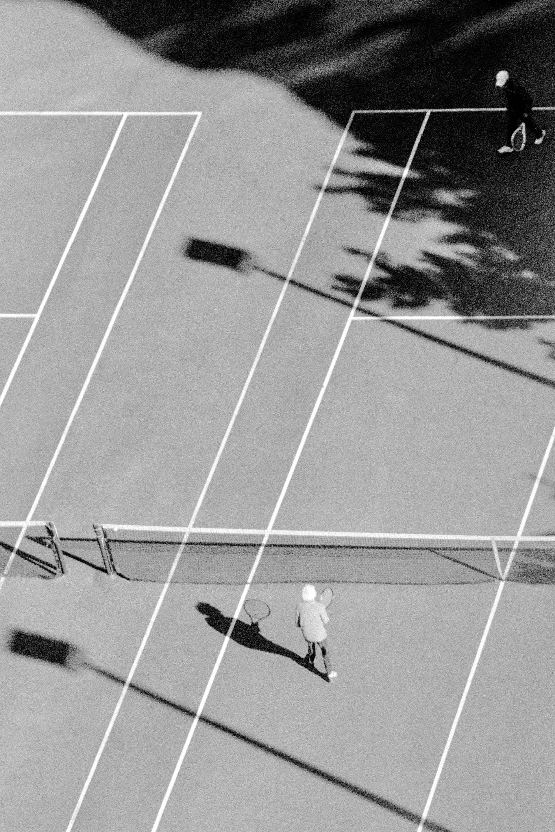 Parallels, 2022. Minolta STsi x Ilford Delta 400.