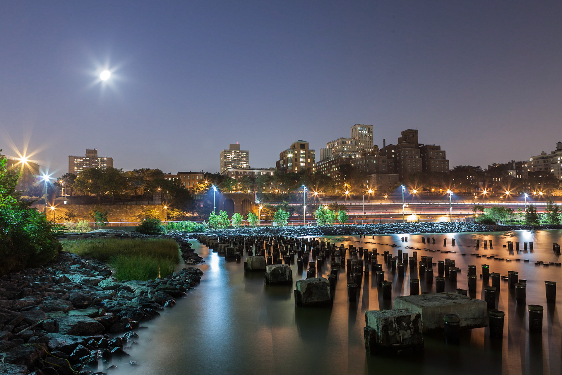 View over the old piers at Brooklyn Bridge Park towards the BQE and Brooklyn Heights