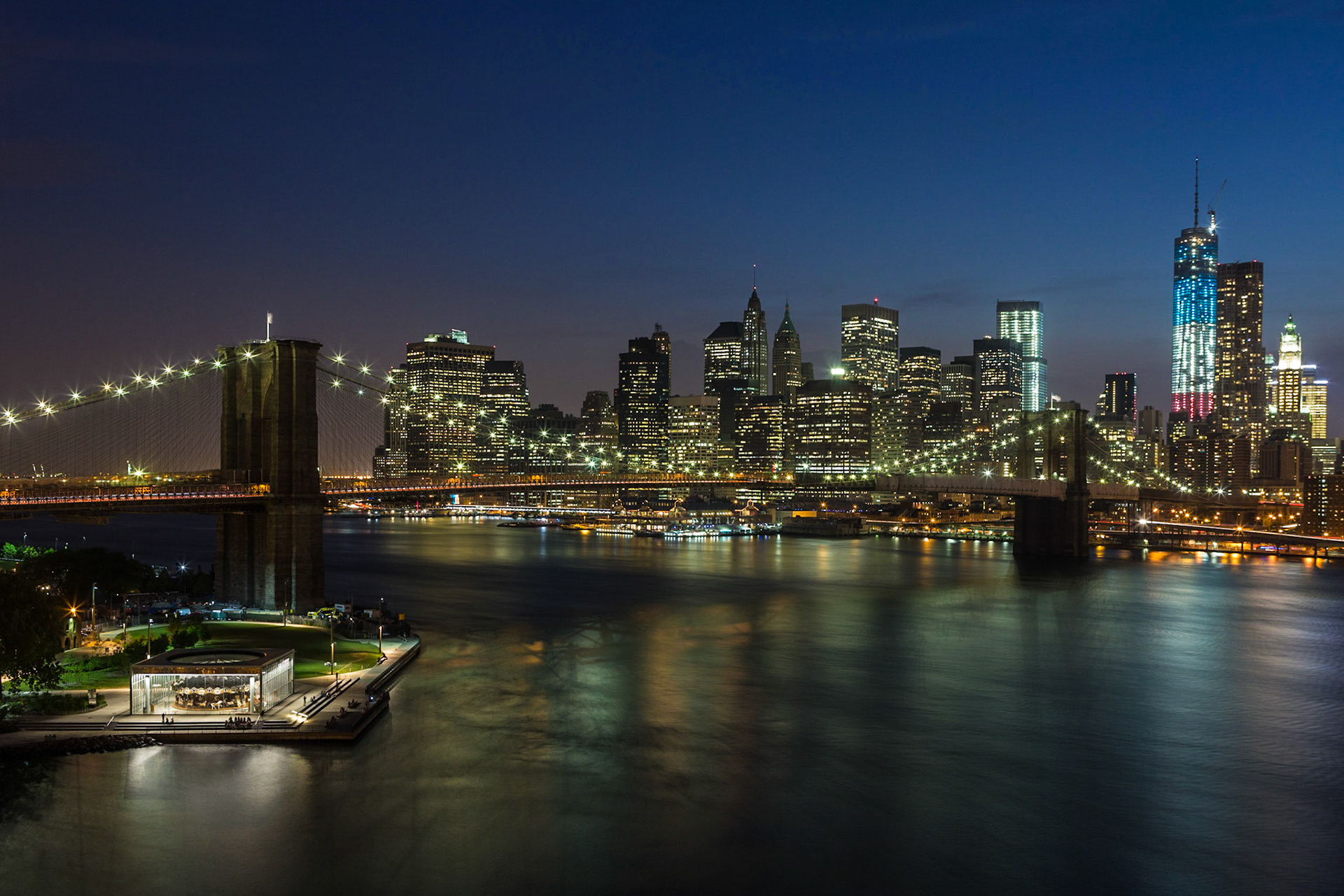 View from Manhattan Bridge over the East River towards Brooklyn Bridge and Downtown Manhattan