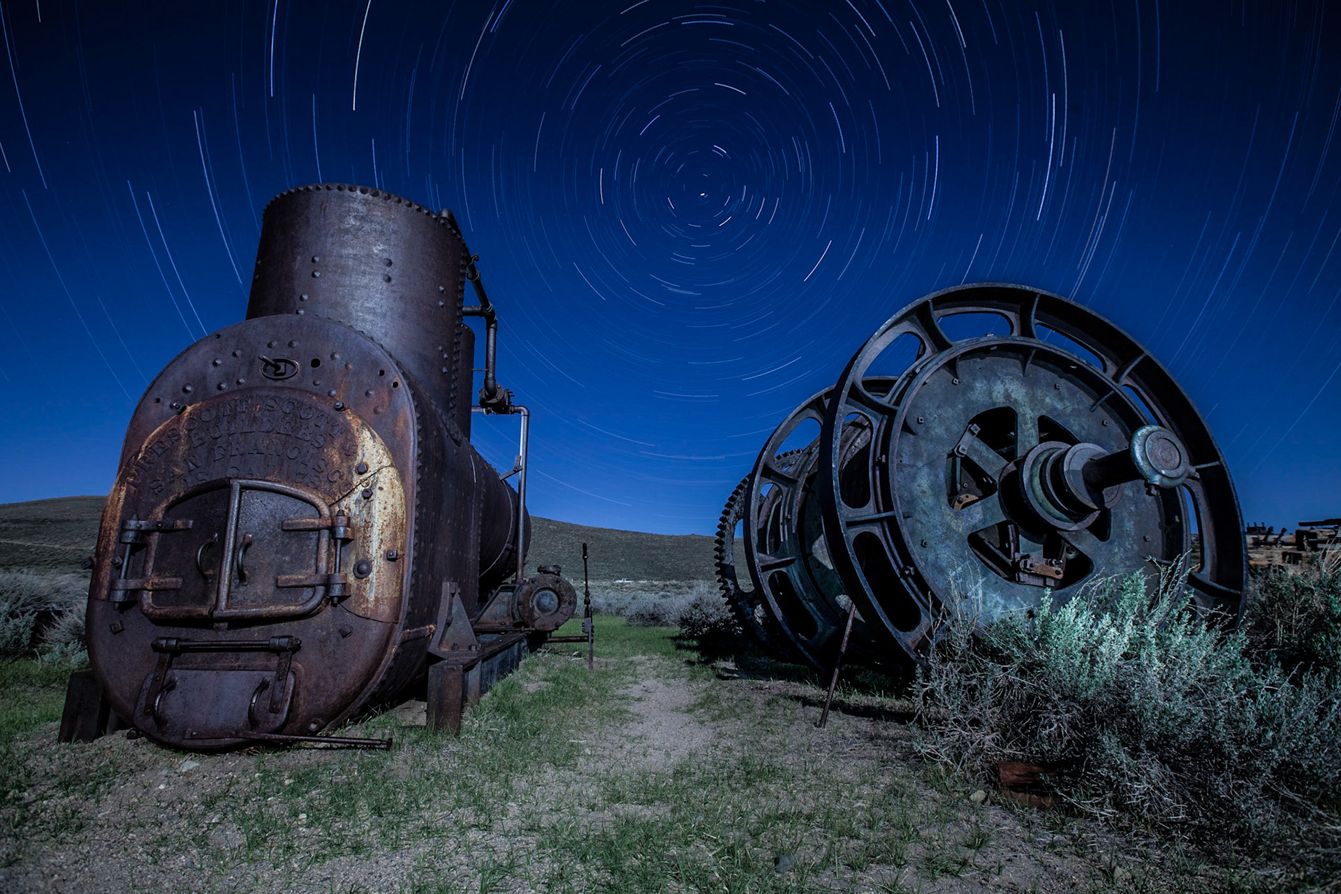 Night photography of old equipment at the Bodie Ghost Town