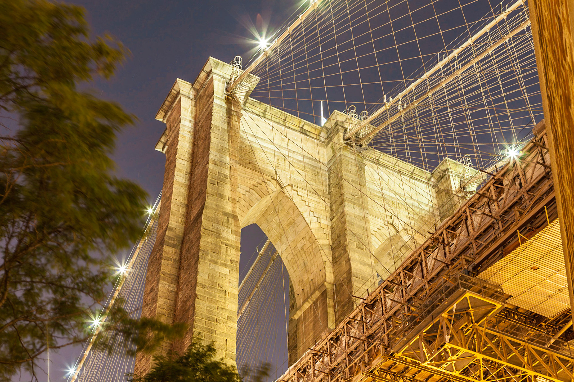 The Brooklyn side pylon of the Brooklyn Bridge at night