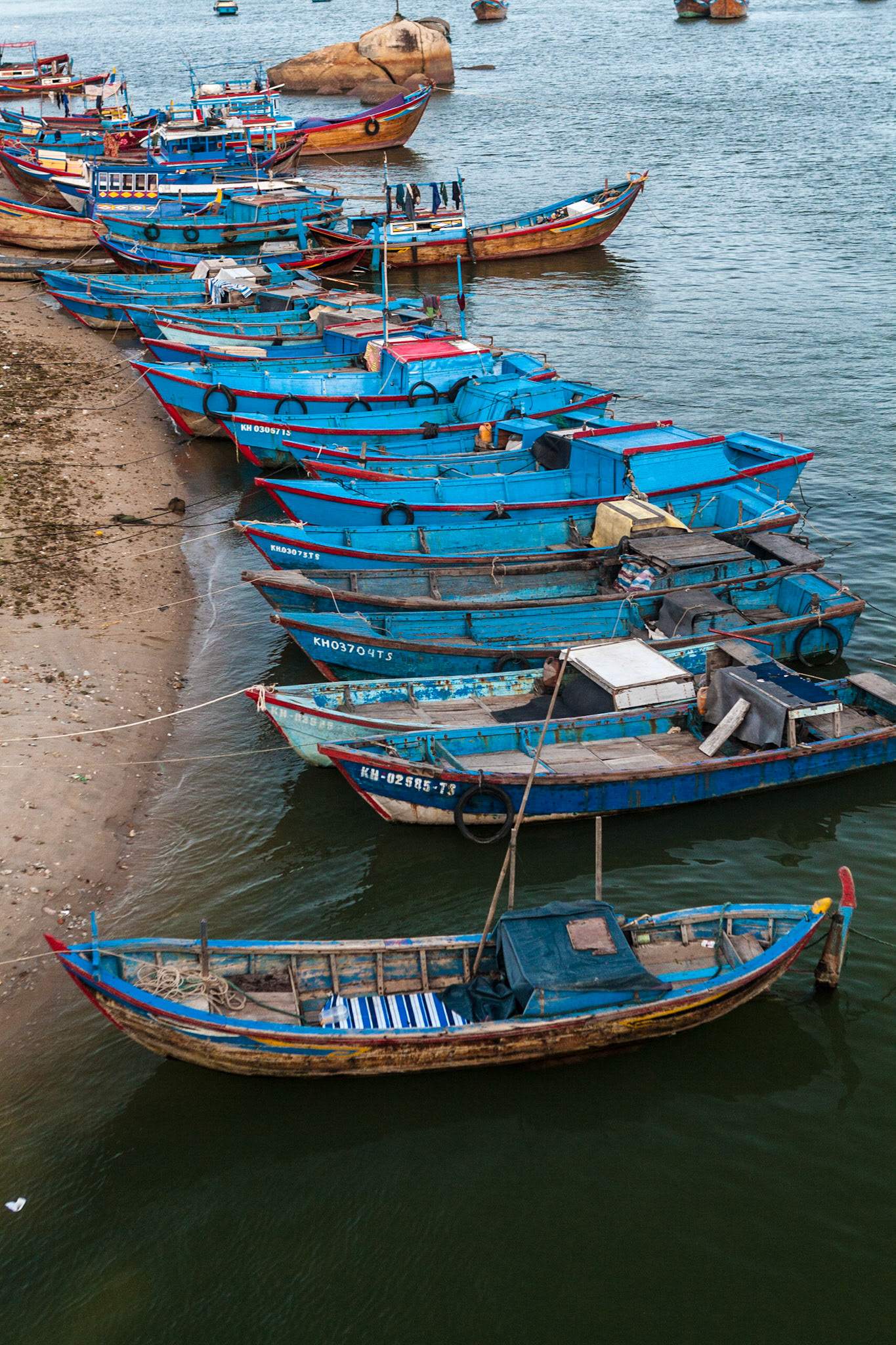 A row of fishing boats in the Cai River at Nha Trang, Vietnam