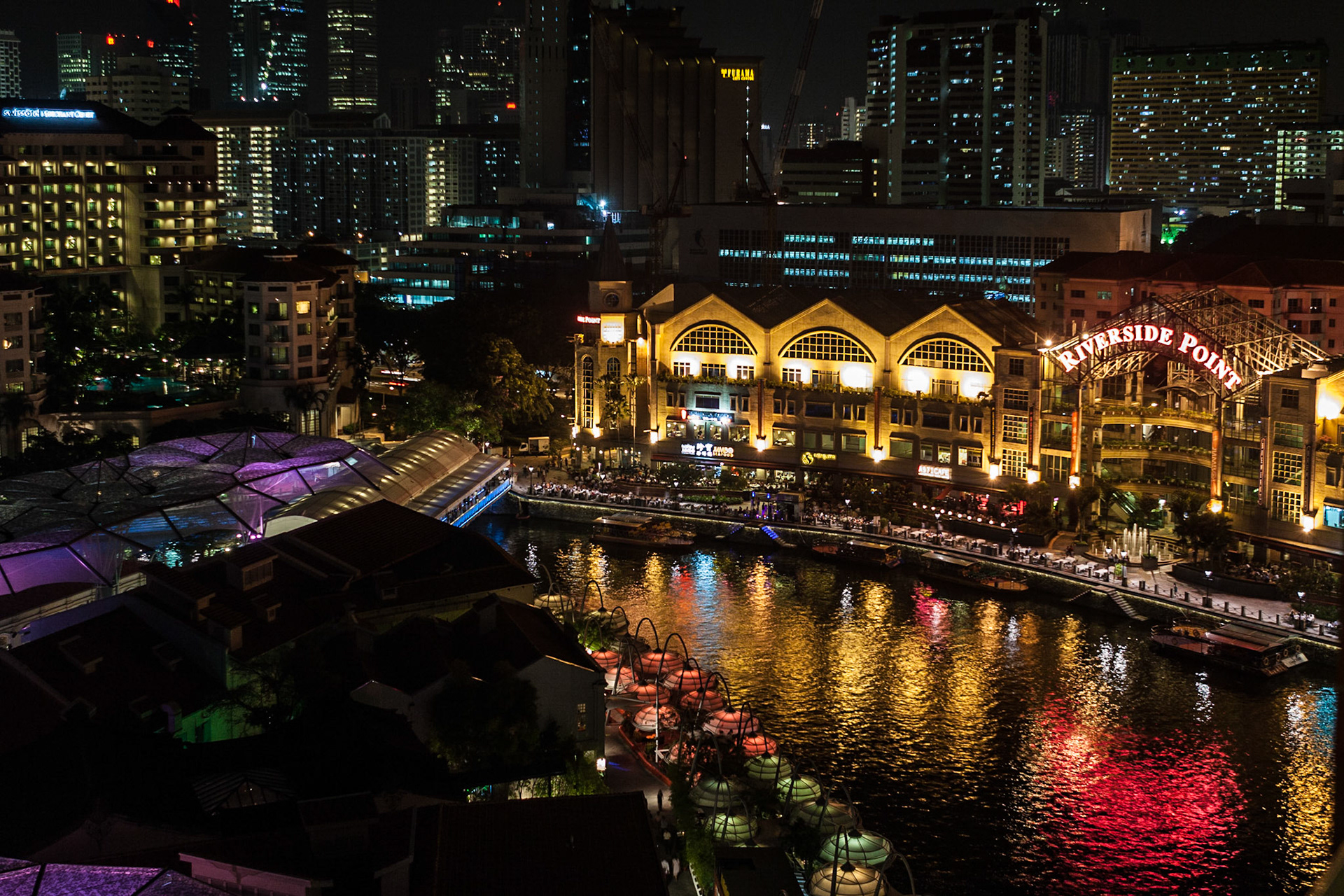 View over Clarke Quay and the Singapore Skyline at night