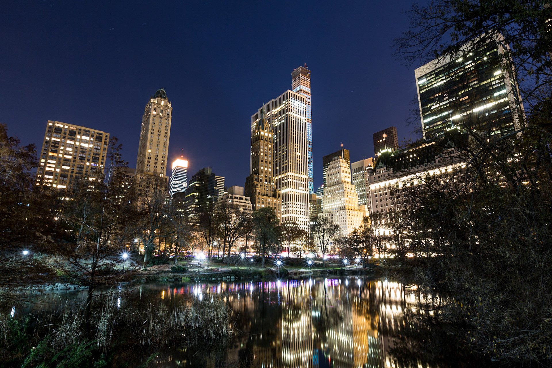 View of the Midtown Manhattan Skyline from The Pond in Central Park at night