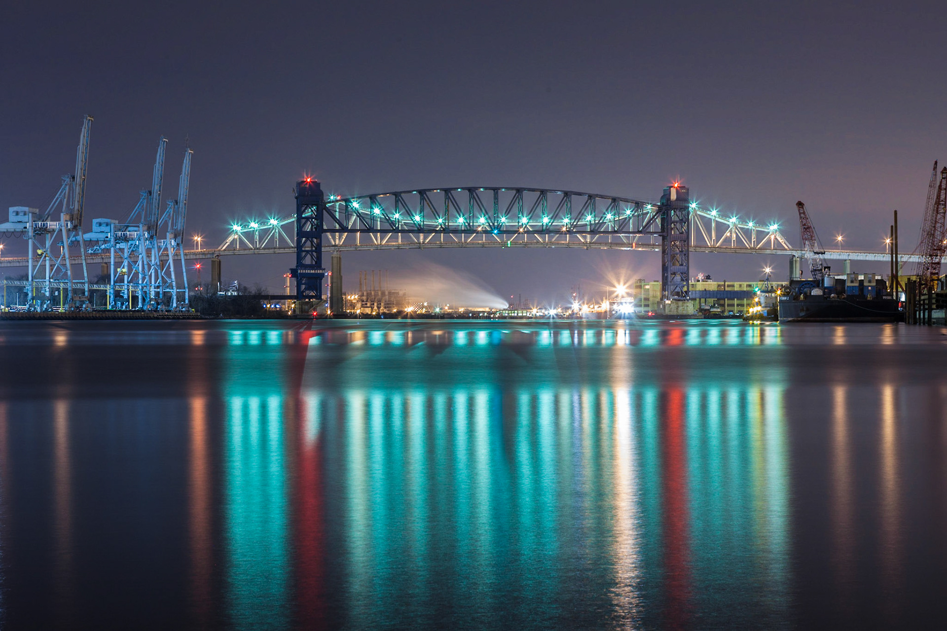 The Goethals Bridge (with a railroad bridge in front) seen from the New Jersey side across the Kill Van Kull