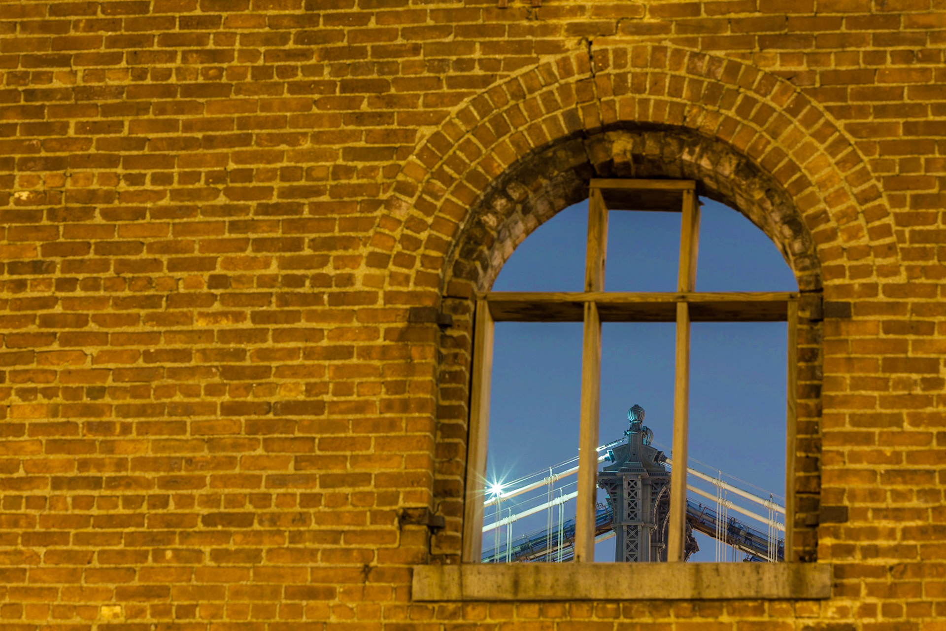Manhattan Bridge through the Window of an old warehouse at Fulton Landing
