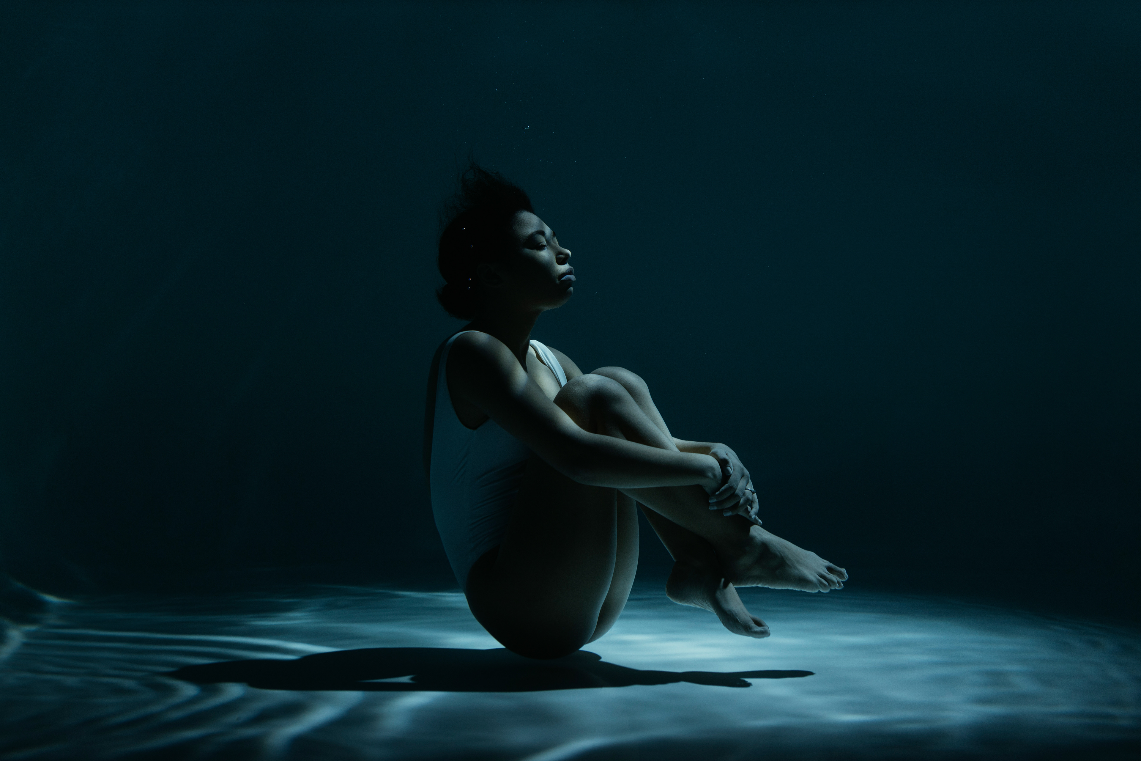 Embracing the silence — strength in stillness, power in vulnerability. By Svetlana Iakusheva