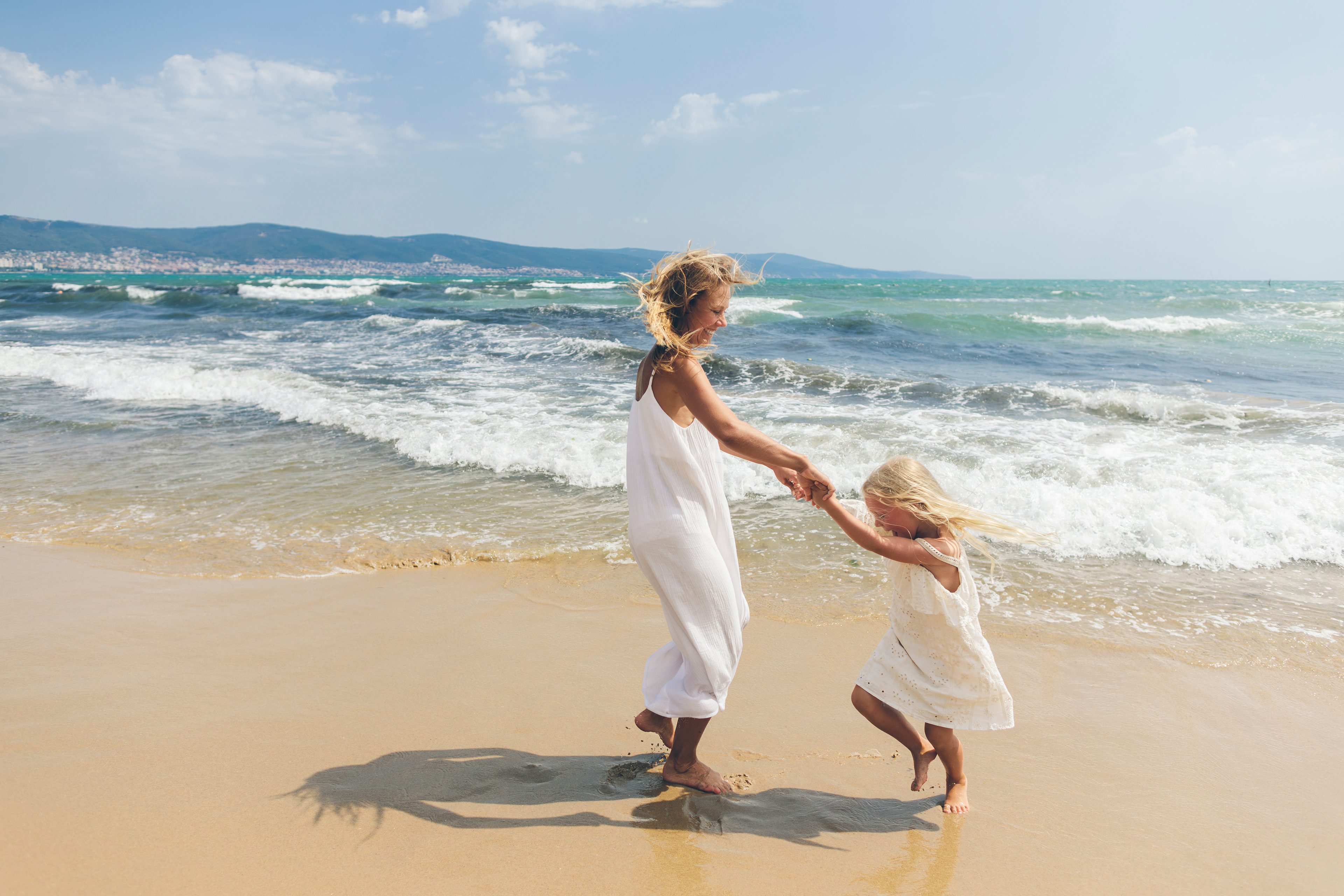 Waves of joy — barefoot bonding in motion. By Svetlana Iakusheva
