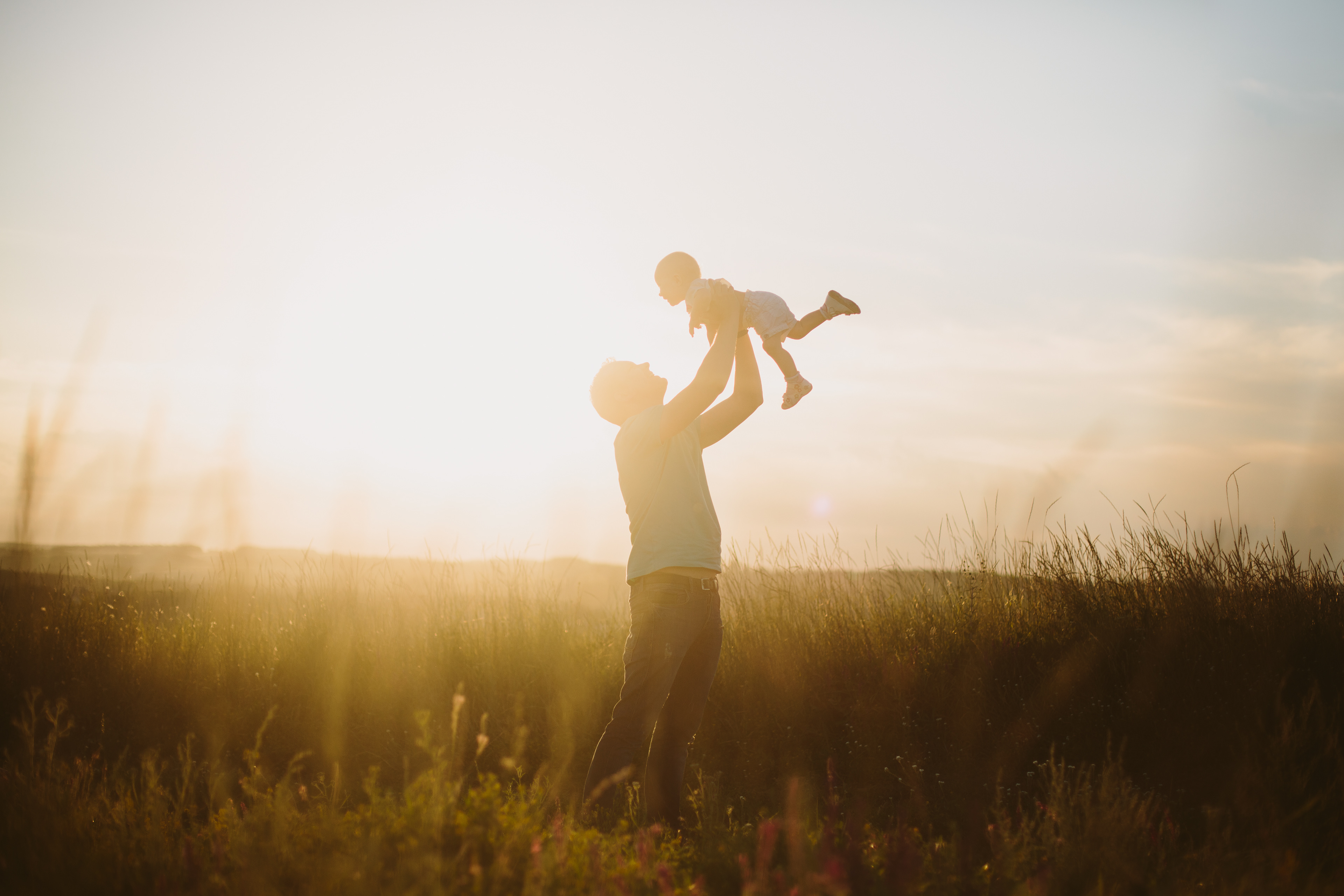 Lifted by love — golden light, weightless trust. By Svetlana Iakusheva