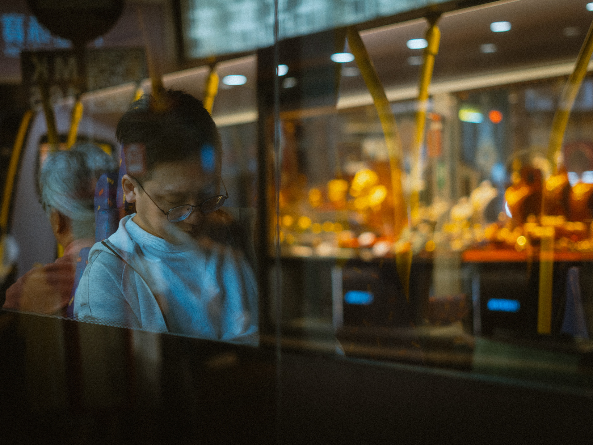 person in bus, hongkong, 2025
