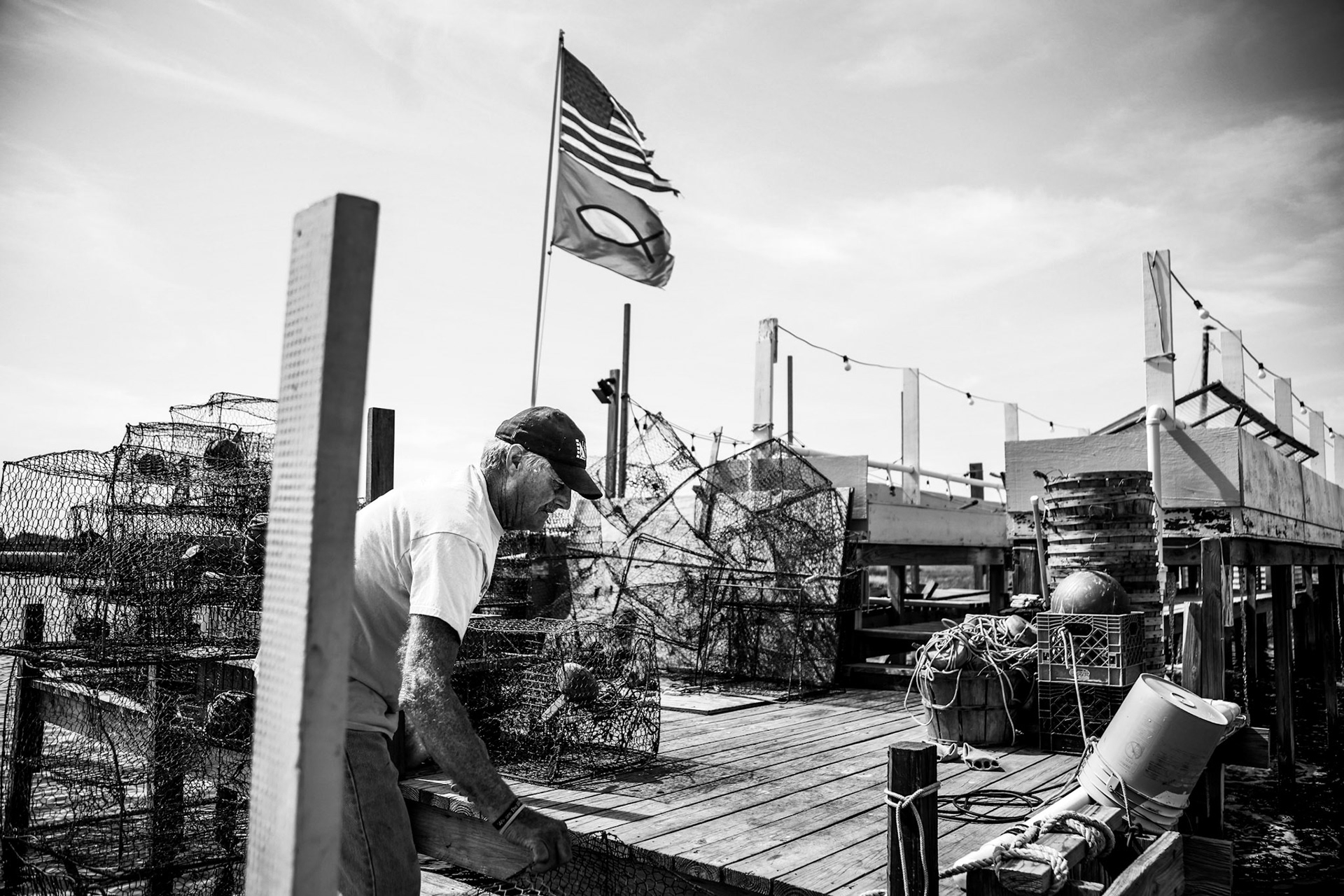James "Ooker" Eskridge, the mayor of the Island Tangier located in the Chesapeake bay adjusts crab traps on his shanty. Tangier is a swiftly disappearing island home to 400 people.