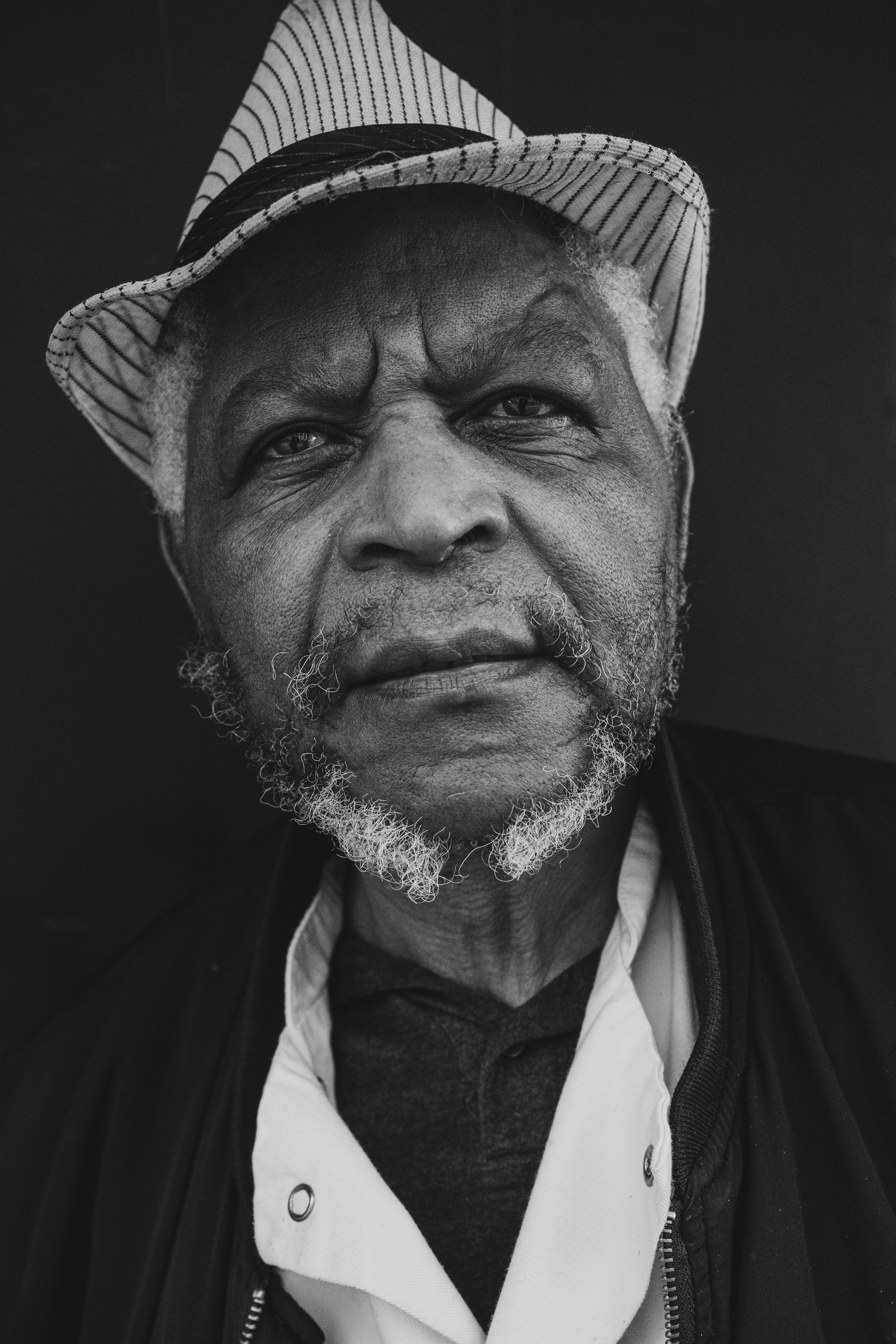 “I was late for work, but you asked… so I stopped.” On his way to work, Kumi stopped for a moment. He was running late but still offered a smile for the camera. Sometimes the smallest pauses say the most about a person.