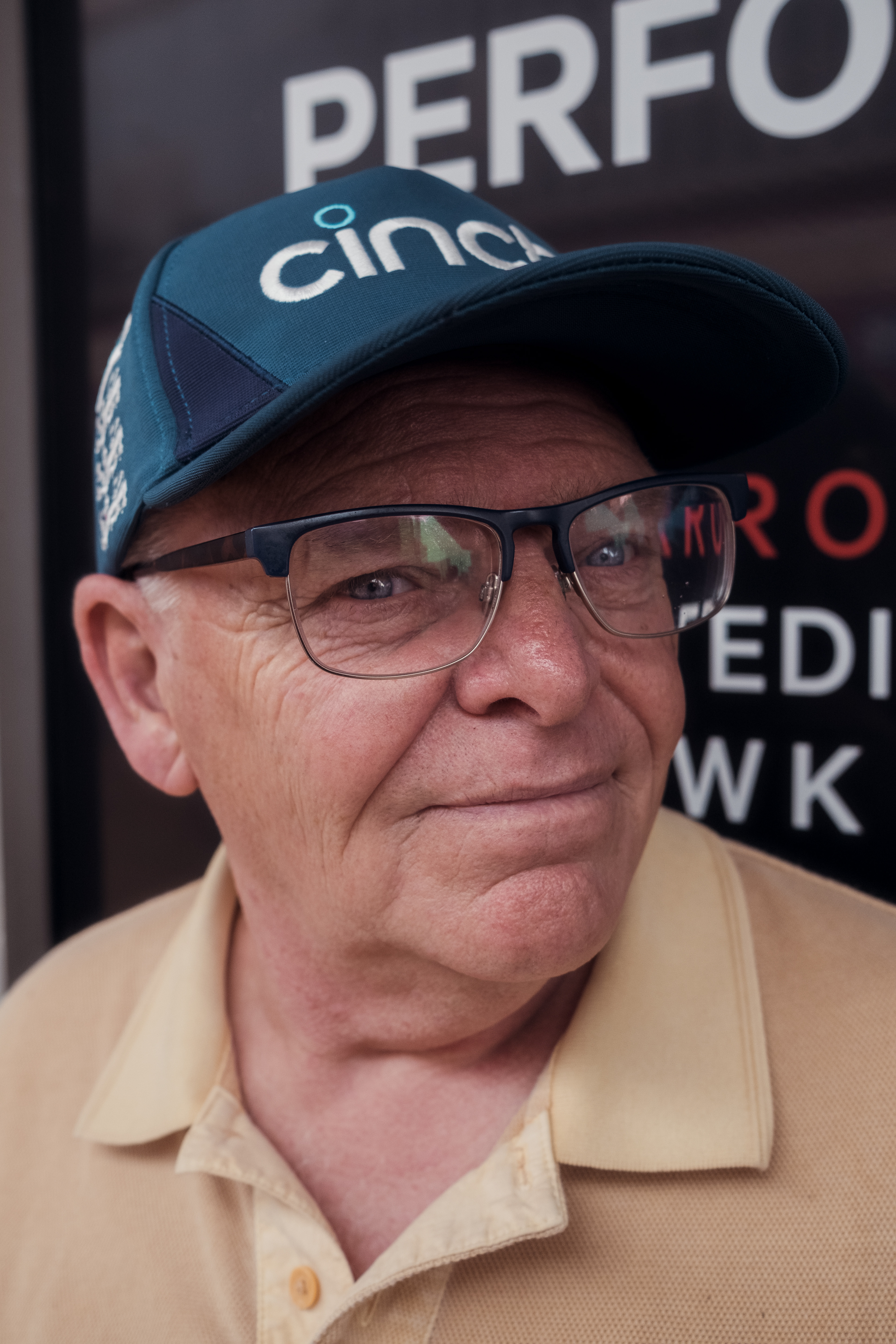 “I’m happiest on the green.” Chris was waiting quietly between Pizza Hut and H. Samuel, leaning back against the shopfront as the street carried on around him. Dressed in his golf cap and polo, he looked like a man briefly caught between two worlds—one of polished clubs and wide fairways, and another of fast food, jewellery displays, and the bustle of town. He didn’t seem in a hurry to be anywhere else.