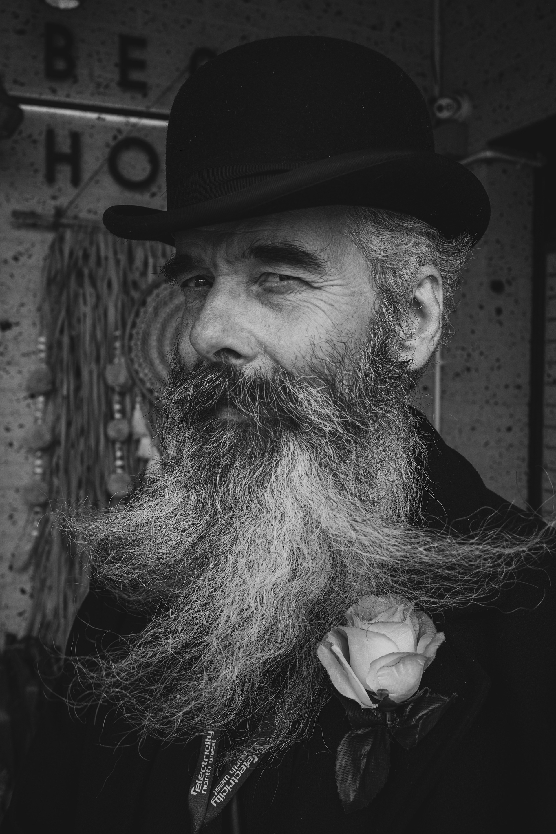 “You can’t be soft in this job. But you can still be kind.” Outside the Beach House, Phil stood watch. He worked the door with a mix of firmness and grace, a presence that said he could handle trouble but preferred to keep things calm. Strength and kindness, held in equal balance..