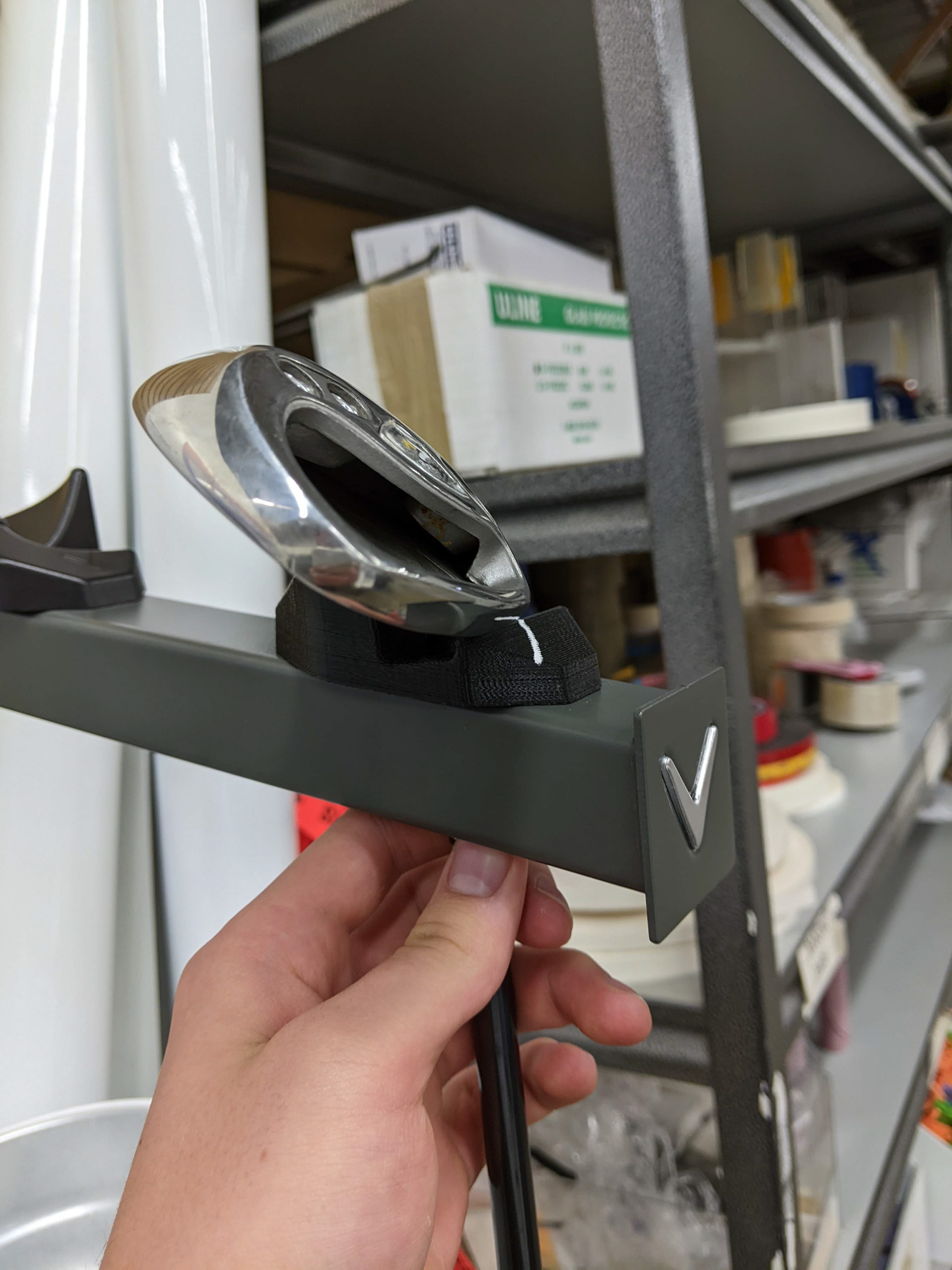 Iron and Club Two-Way Holder Concept for Golf Town