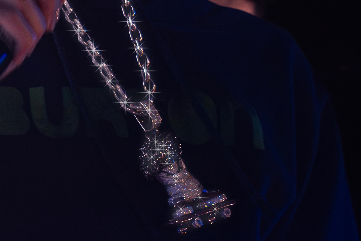 Xaviersobased with his Iced out Tech Deck Dude chain