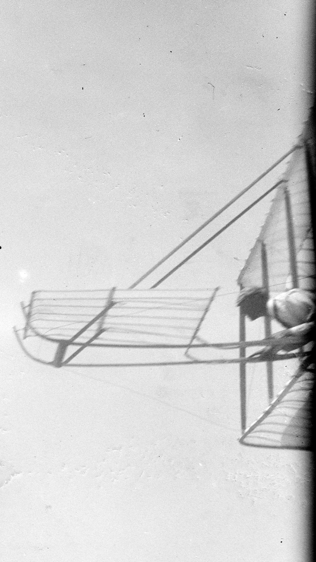 Wilbur Wright gliding, Kitty Hawk, North Carolina, 1901.