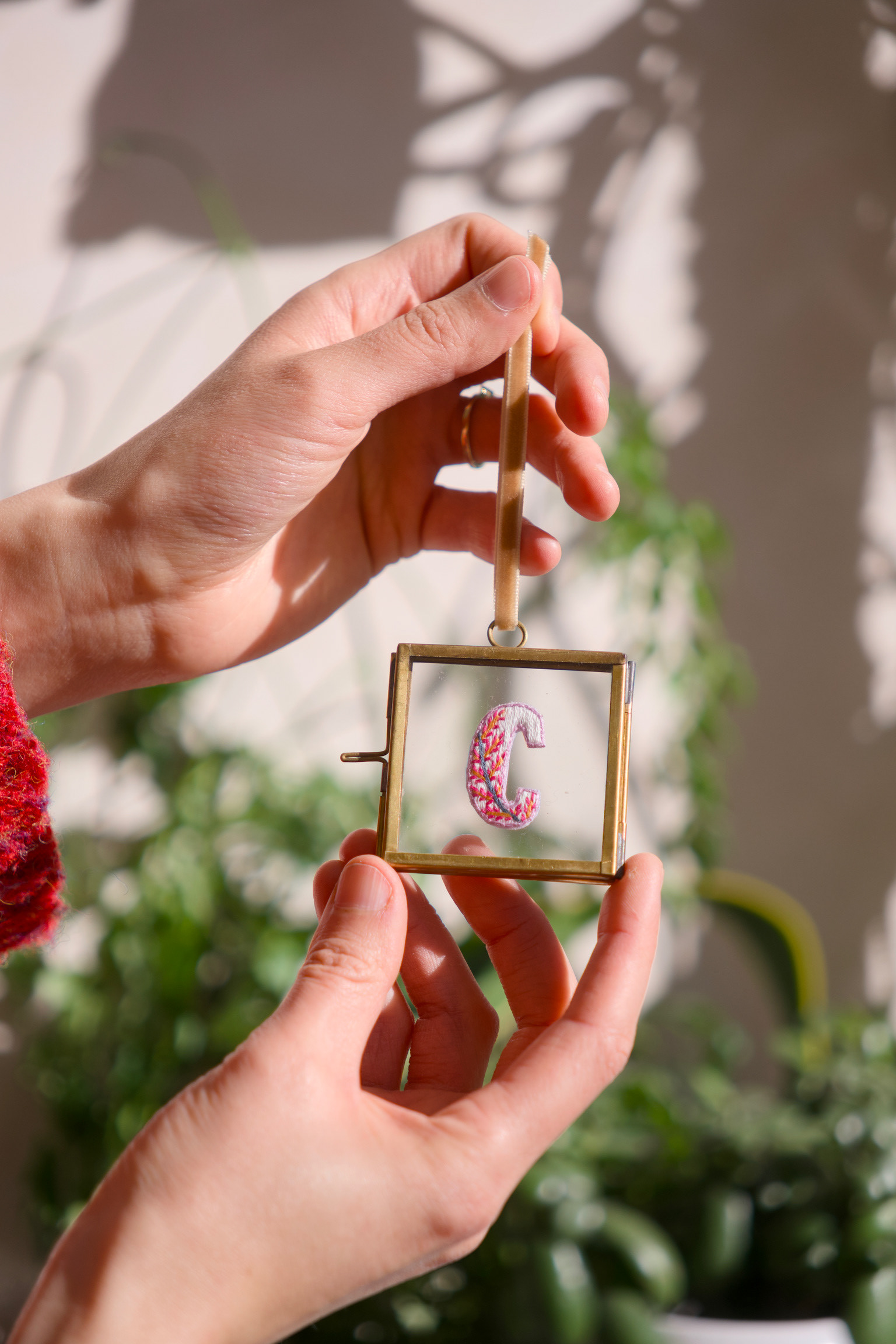 framed embroidered letter