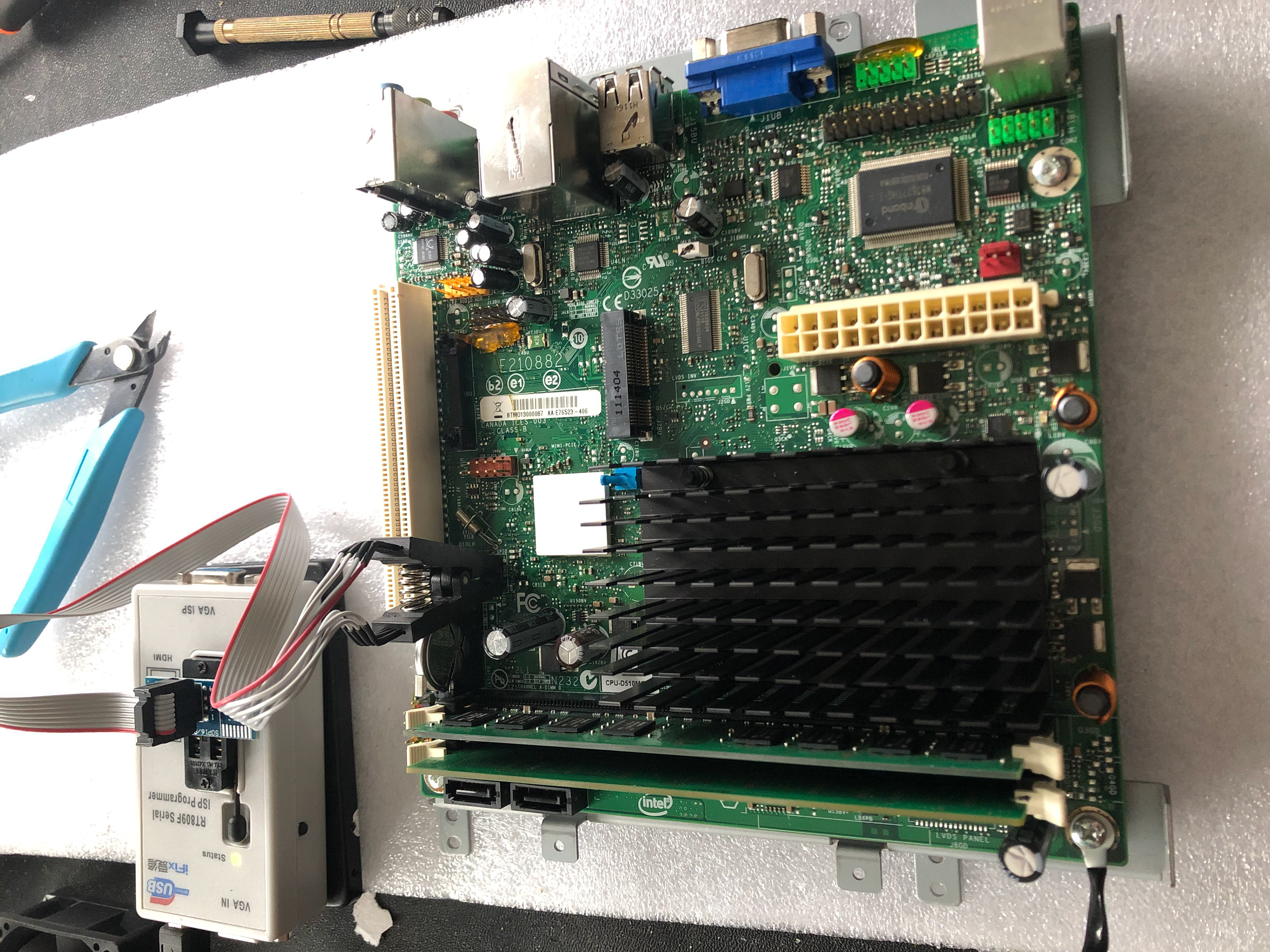 Reflashing the BIOS chip on a customers motherboard