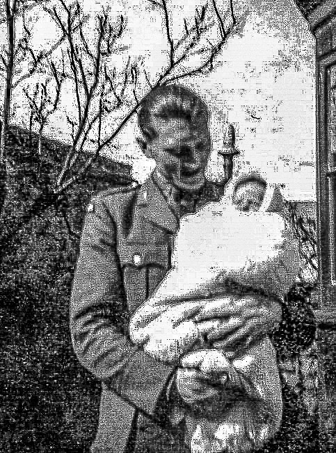 1941Michael in the arms of a Polish Army Officer billeted at 41EHS