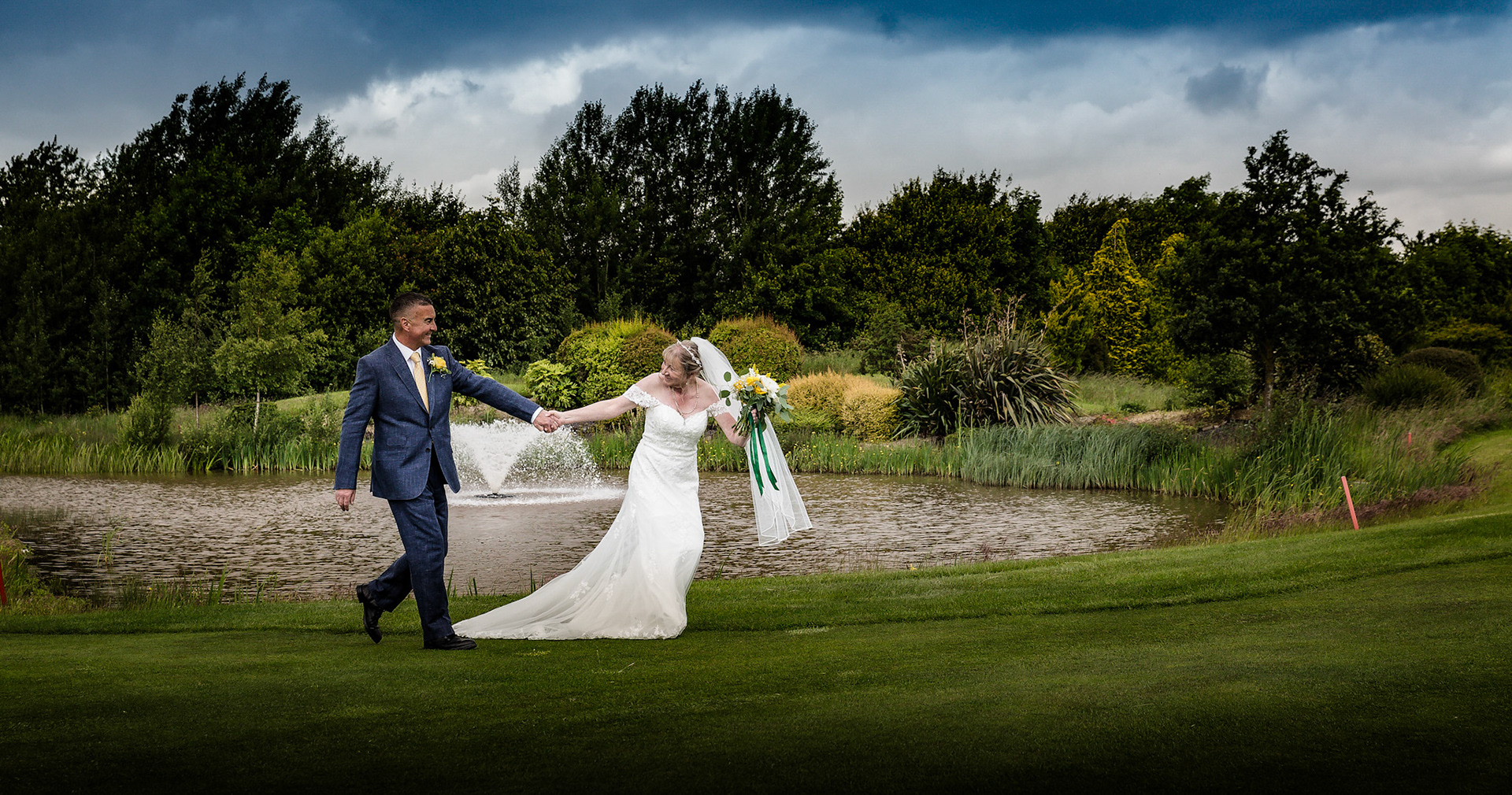 Married couple at golf course by Wedding Photographer in Dudley