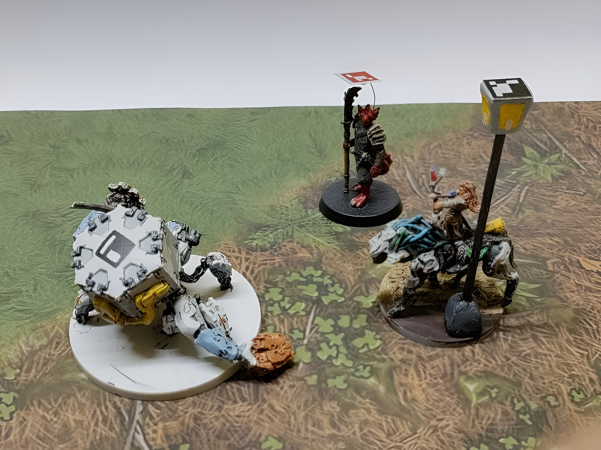 Miniatures with different types of visual markers.